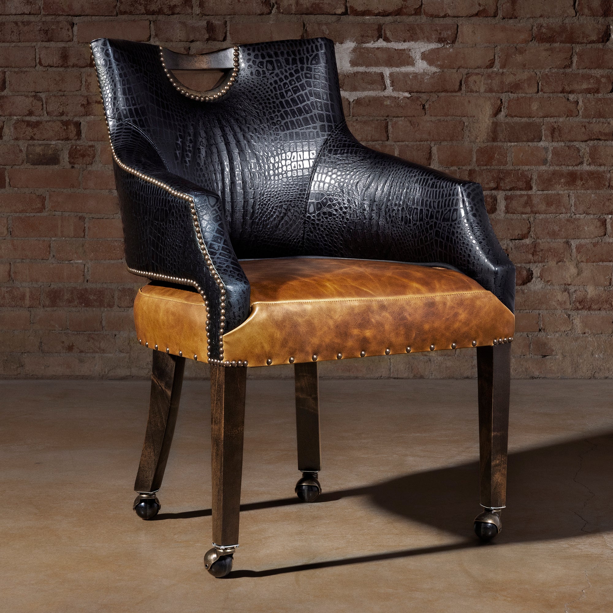Luxury Western poker chair with black croc-embossed leather and saddle top-grain leather seat on casters