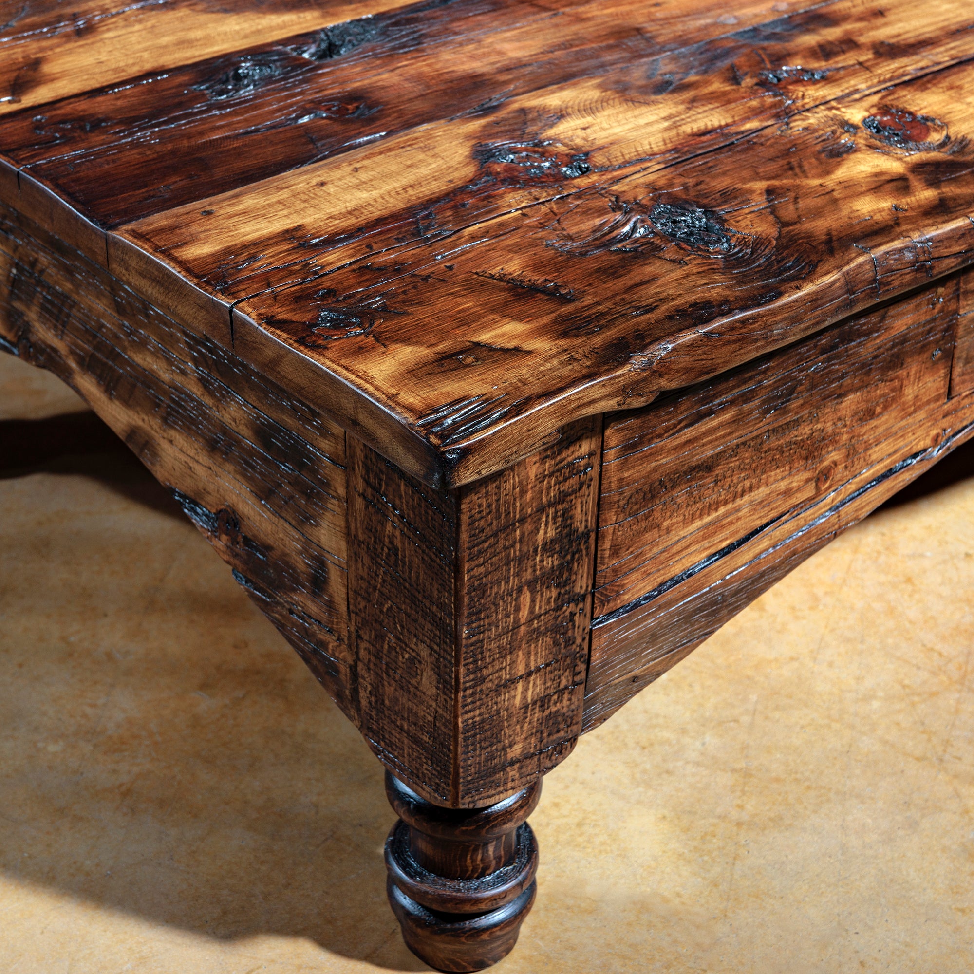 Turned wooden leg with distressed grain and rich stain detail