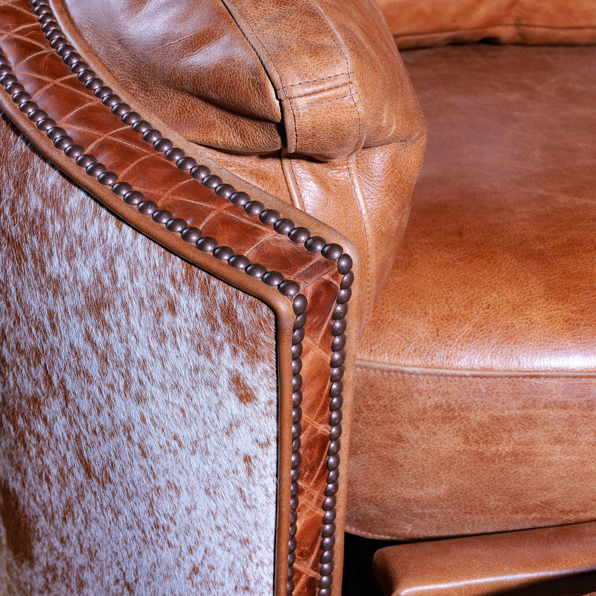 Diamond-quilted leather footrest on Brazos Cuddler Recliner