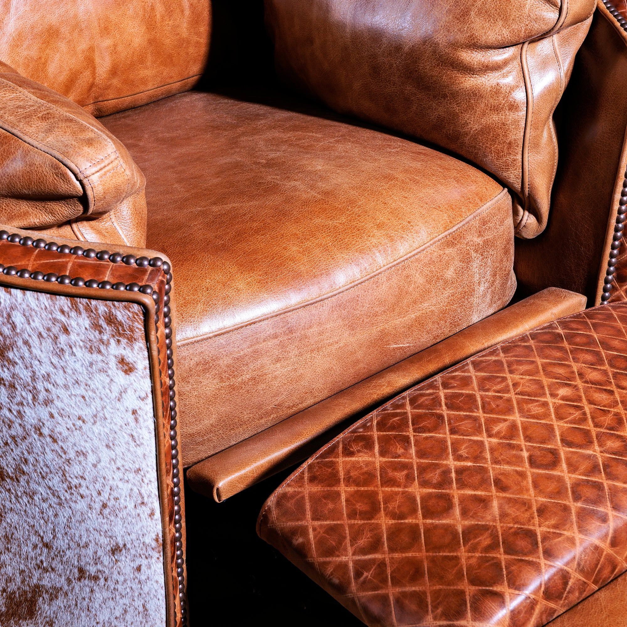 Seat and footrest detail on Western cowhide recliner