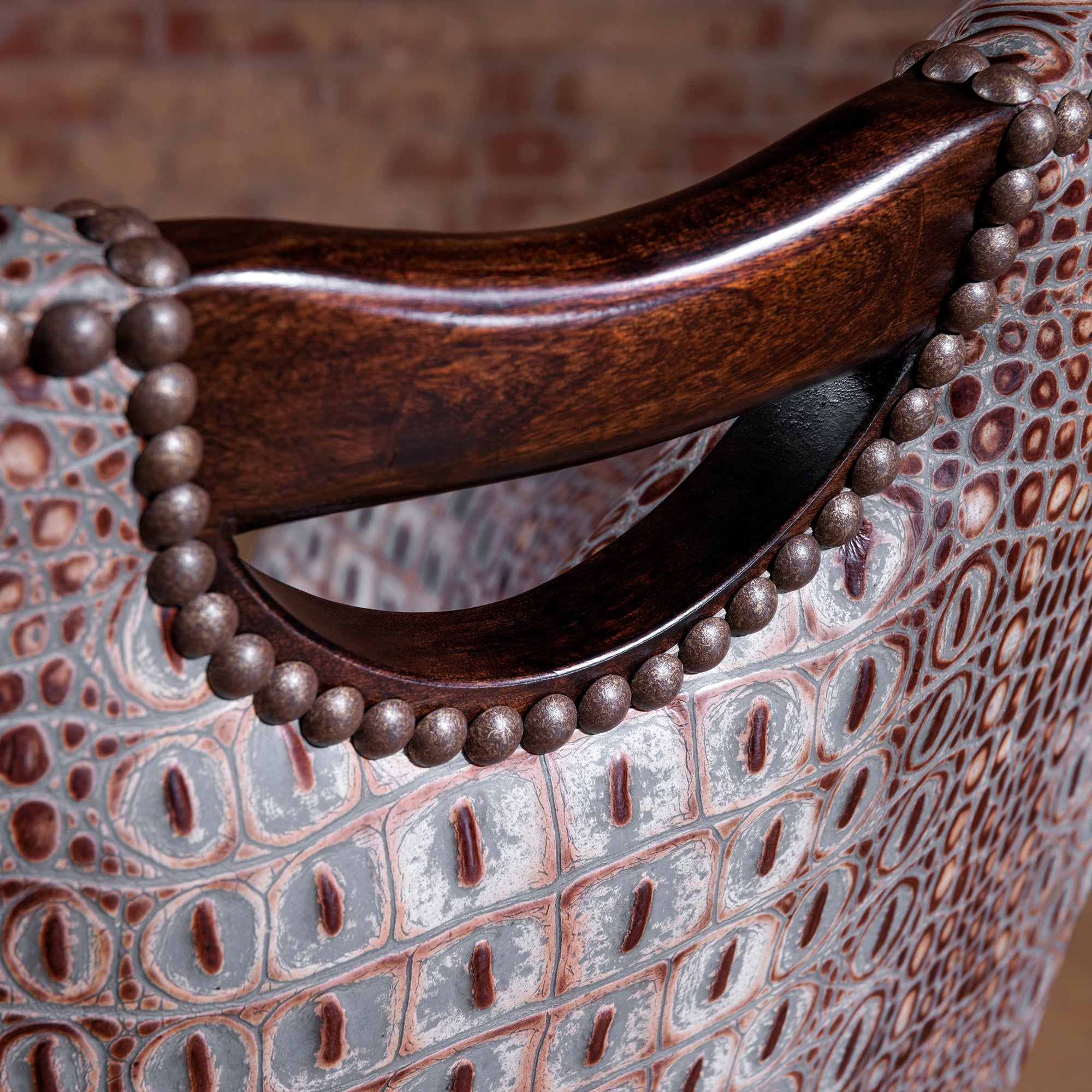 The Gambler’s Mark Western Poker Chair in embossed top-grain leather back detail