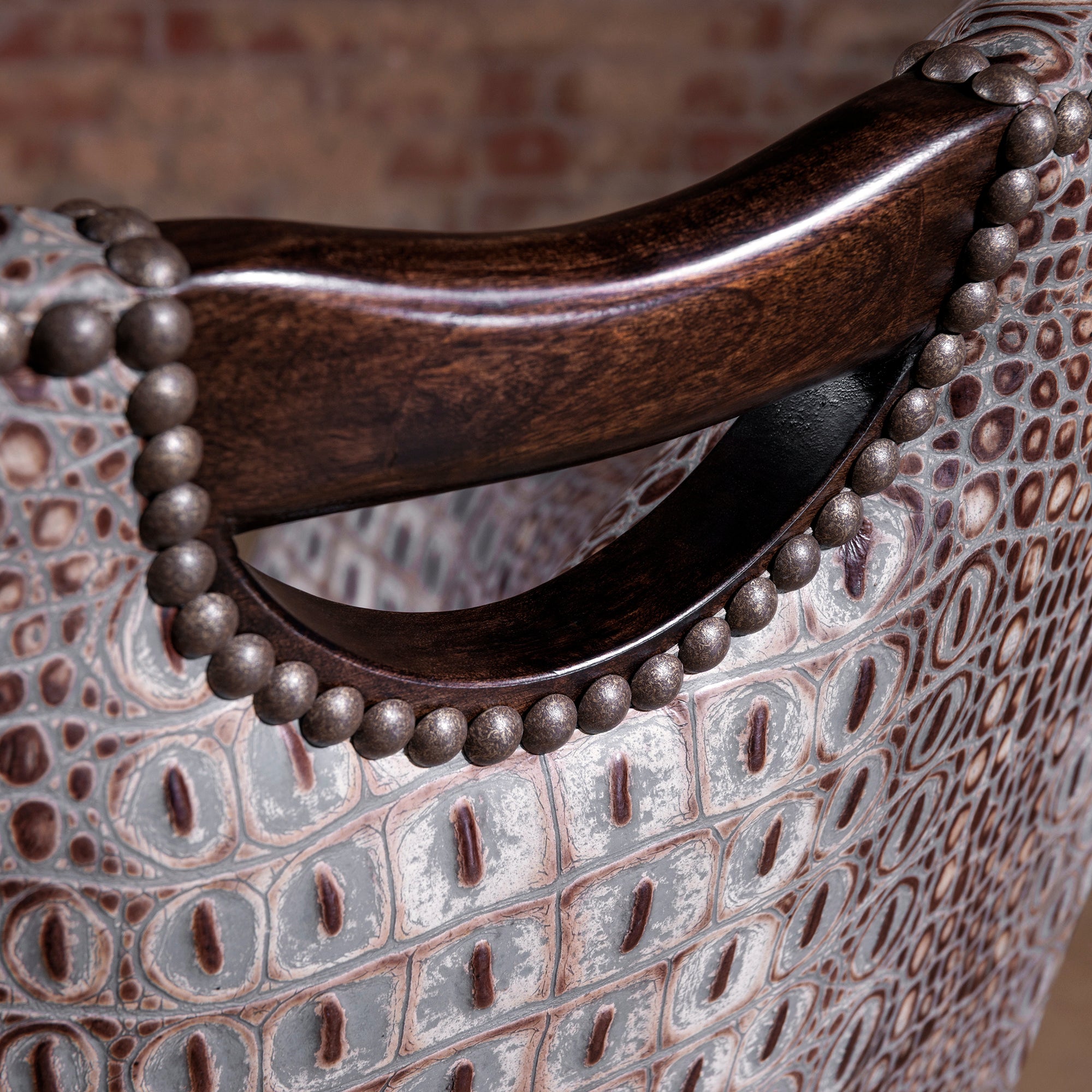 The Gambler’s Mark Western Poker Chair in embossed top-grain leather back detail