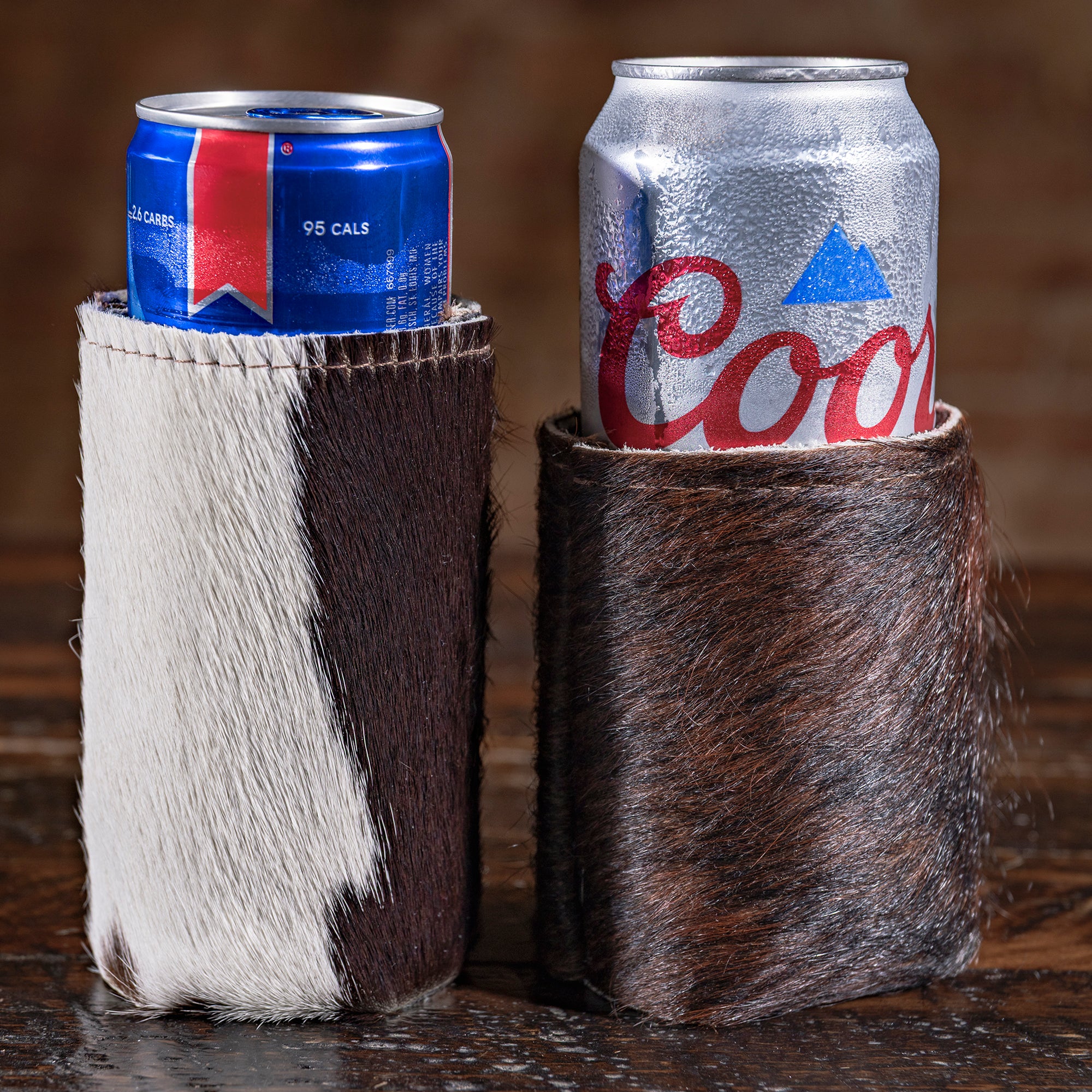 One-of-a-kind cowhide drink koozie — rustic Western bar accessory and ranch gift idea.