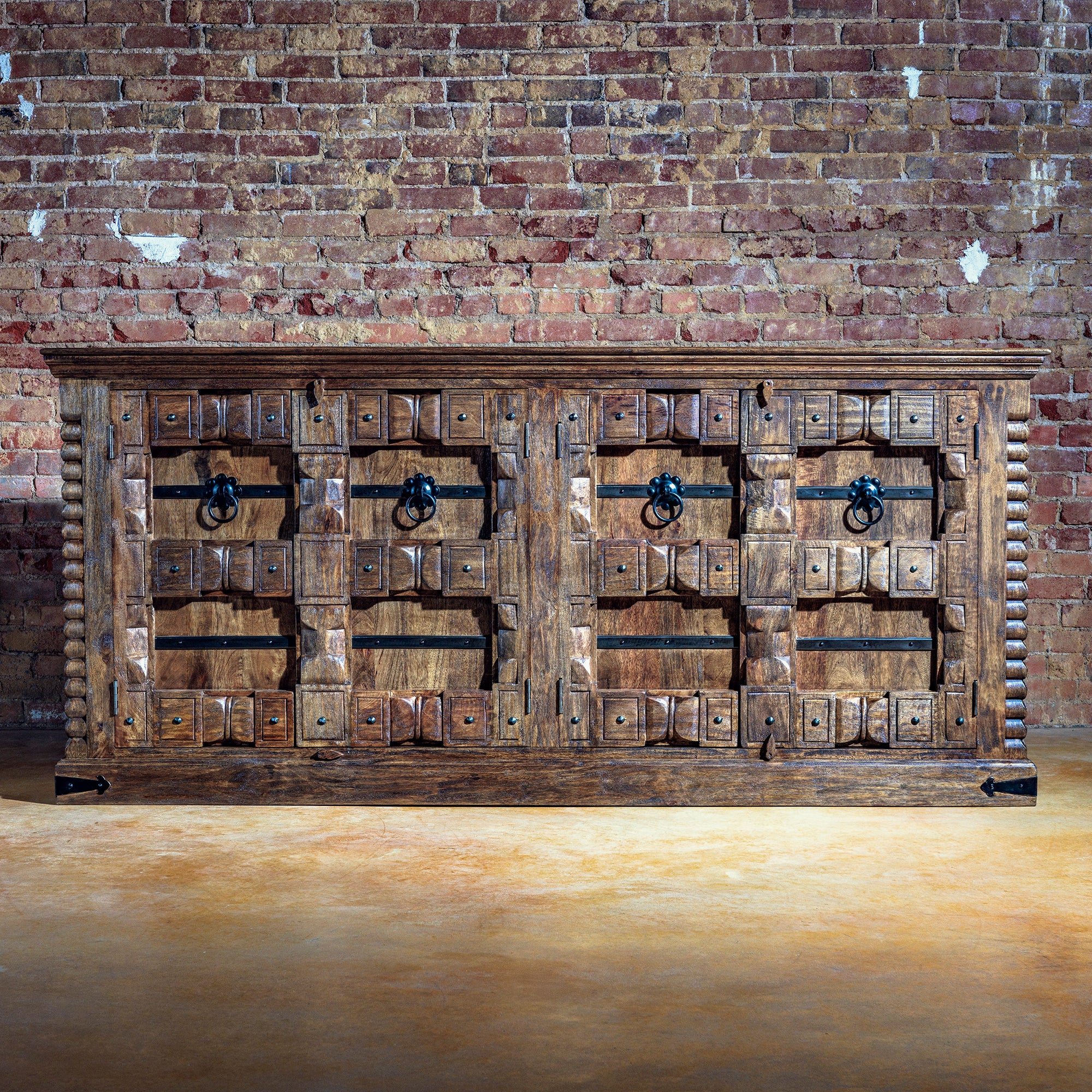 Full view of the Hacienda Ironwood Buffet against rustic brick wall