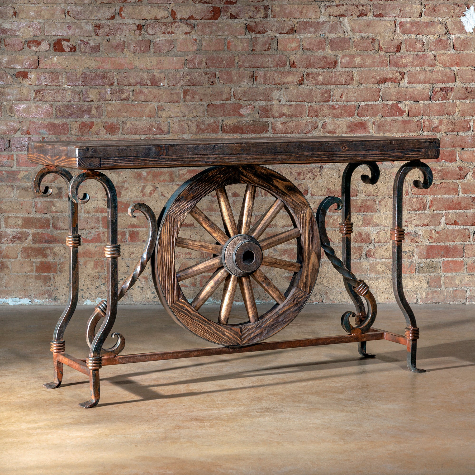 Side view of handcrafted wagon wheel console table