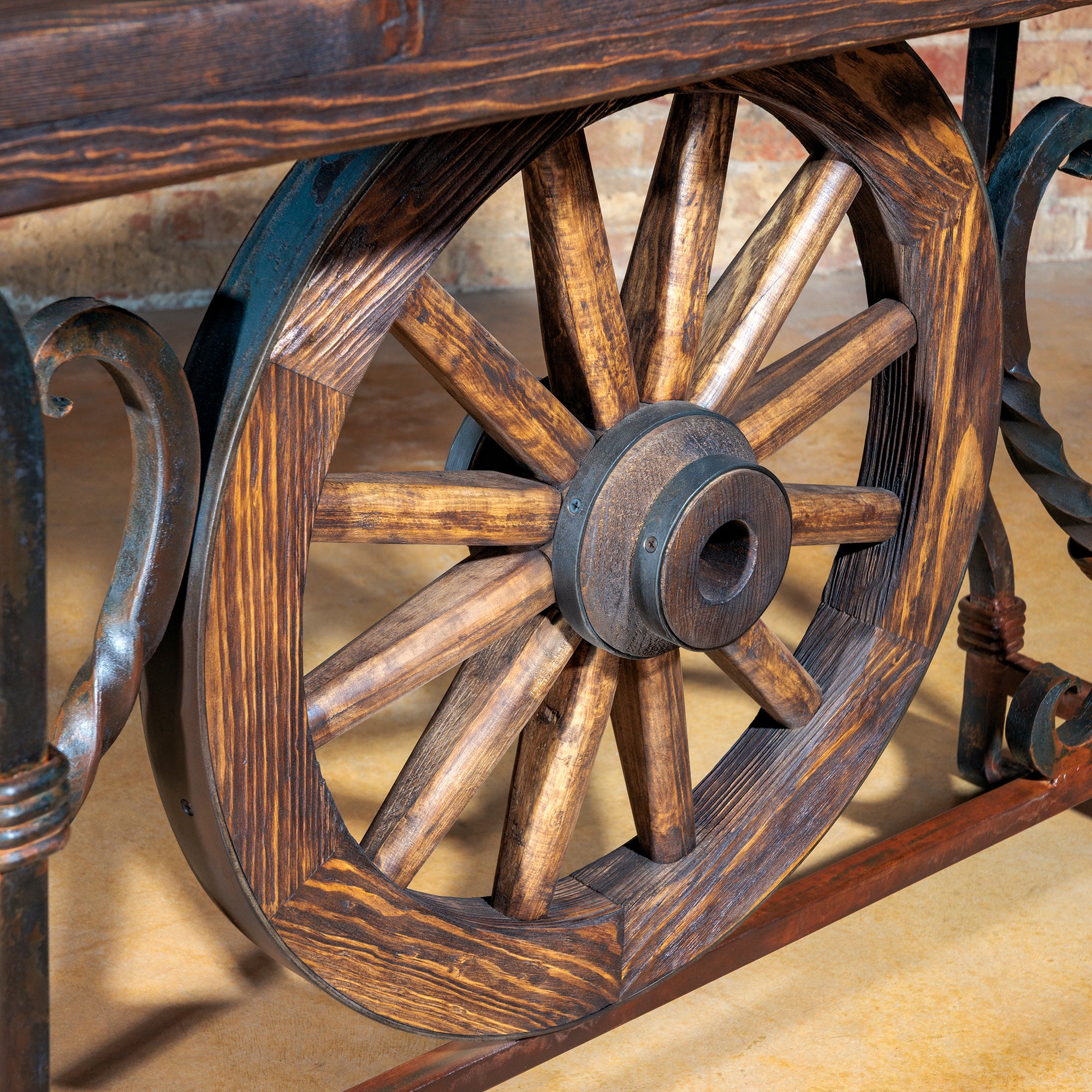 Close-up detail of central wagon wheel carving