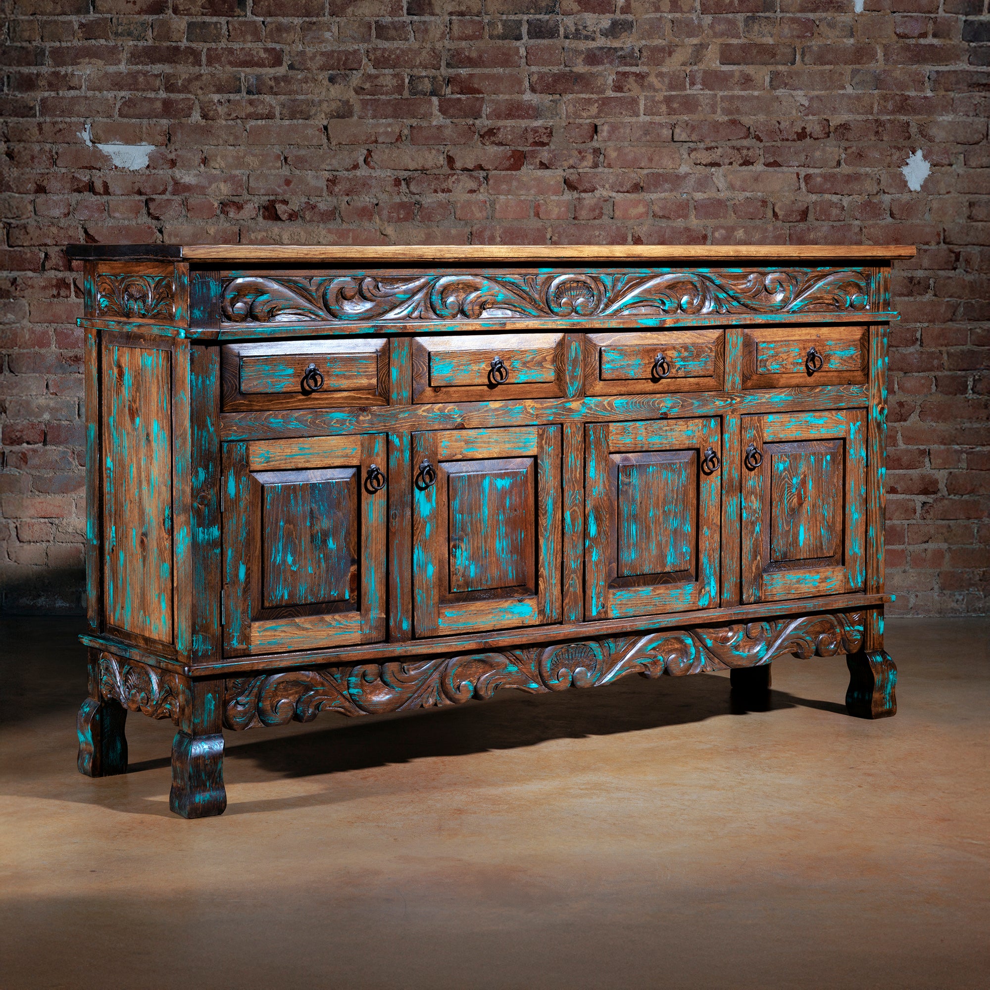 Angled view of Western buffet with turquoise distressed finish