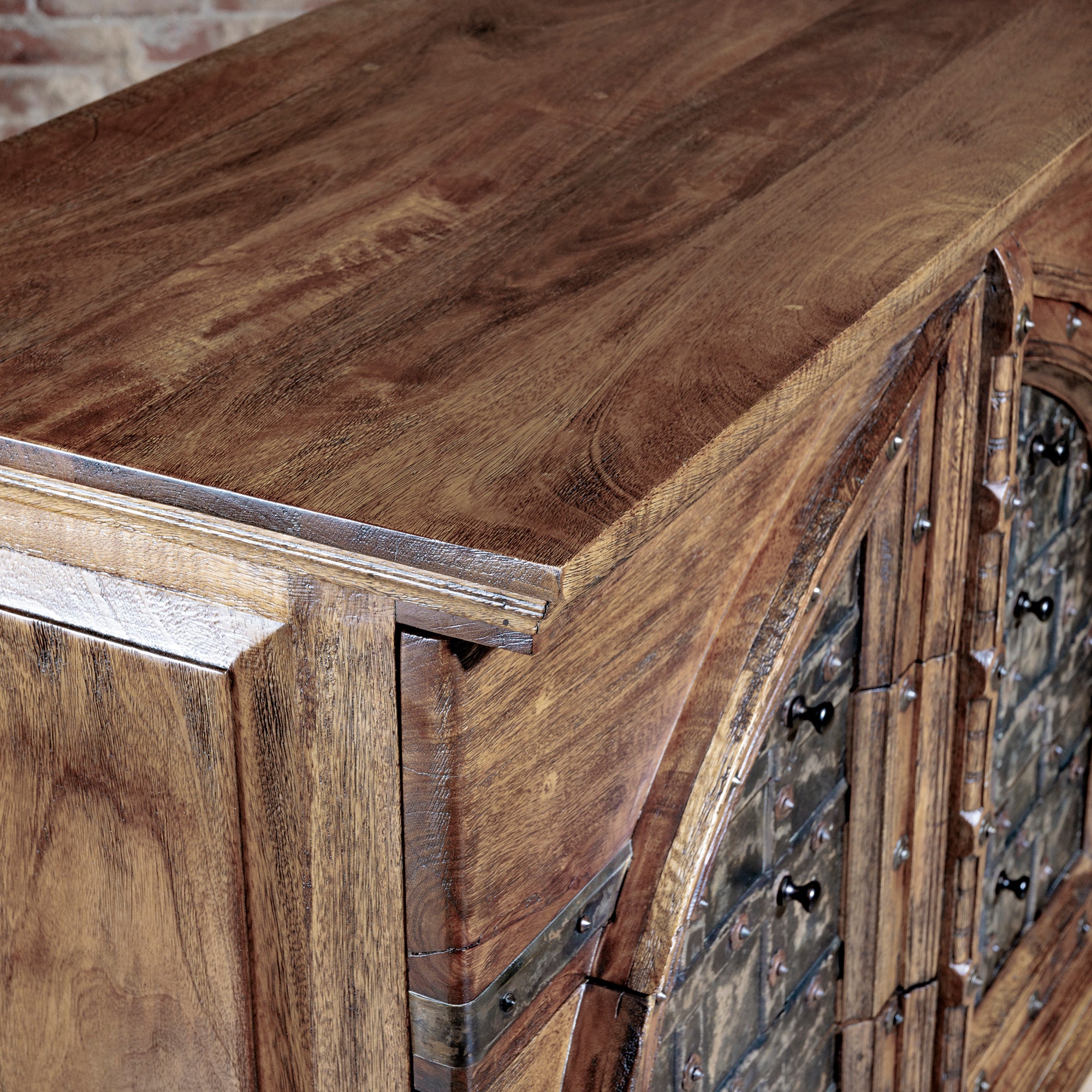 Top grain view of hand-finished mango wood surface