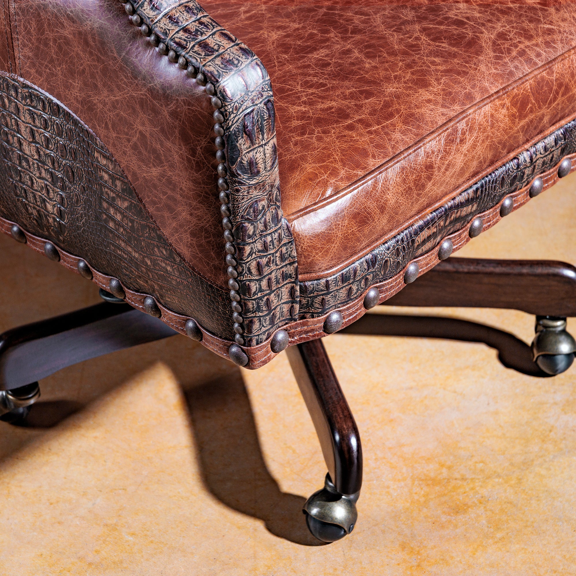 Arm detail of the Laramie Croc Wingback Desk Chair with leather and croc accents