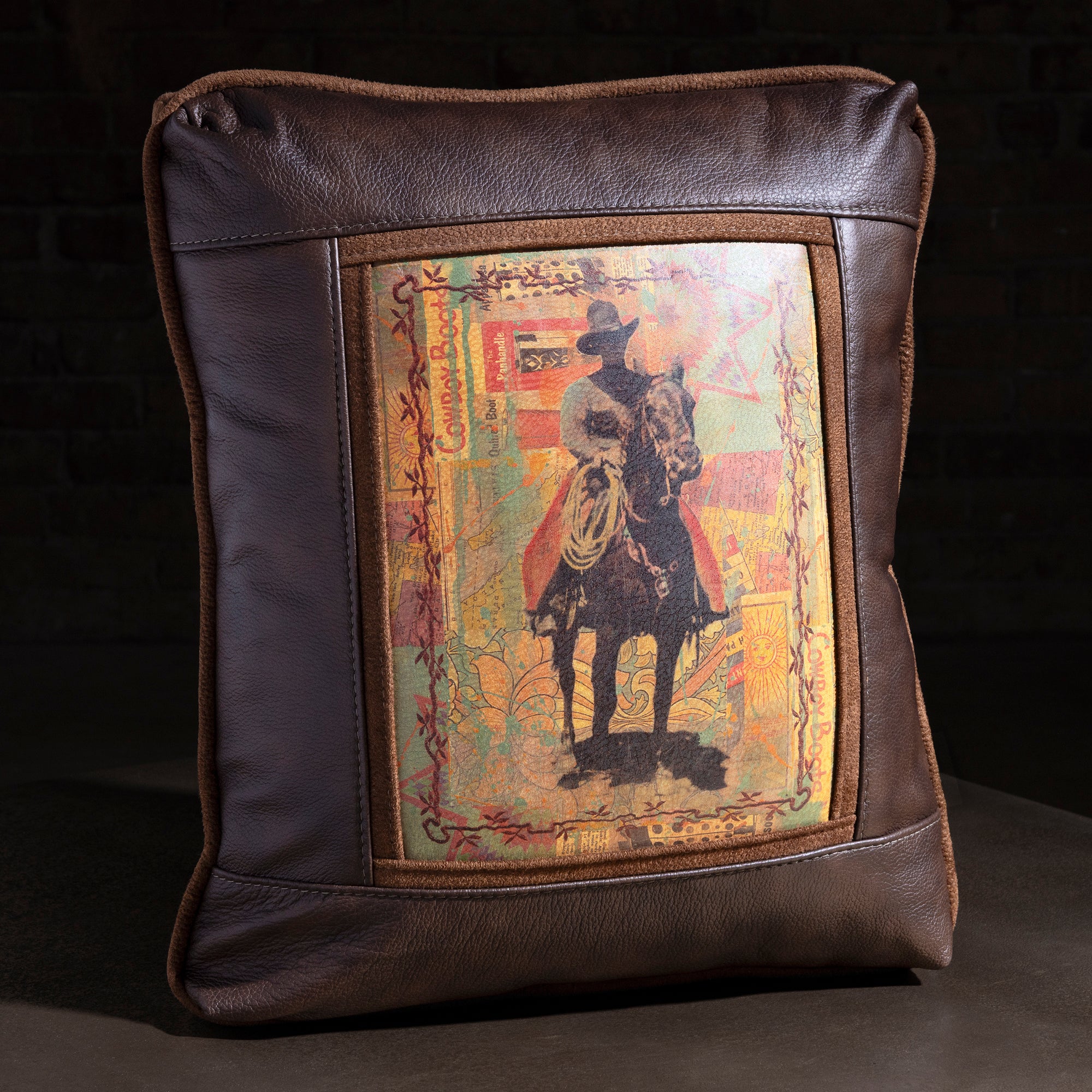 Ledgerline Rider Leather Western Throw Pillow western throw pillow with brown leather frame, cowboy rider collage, and suede trim