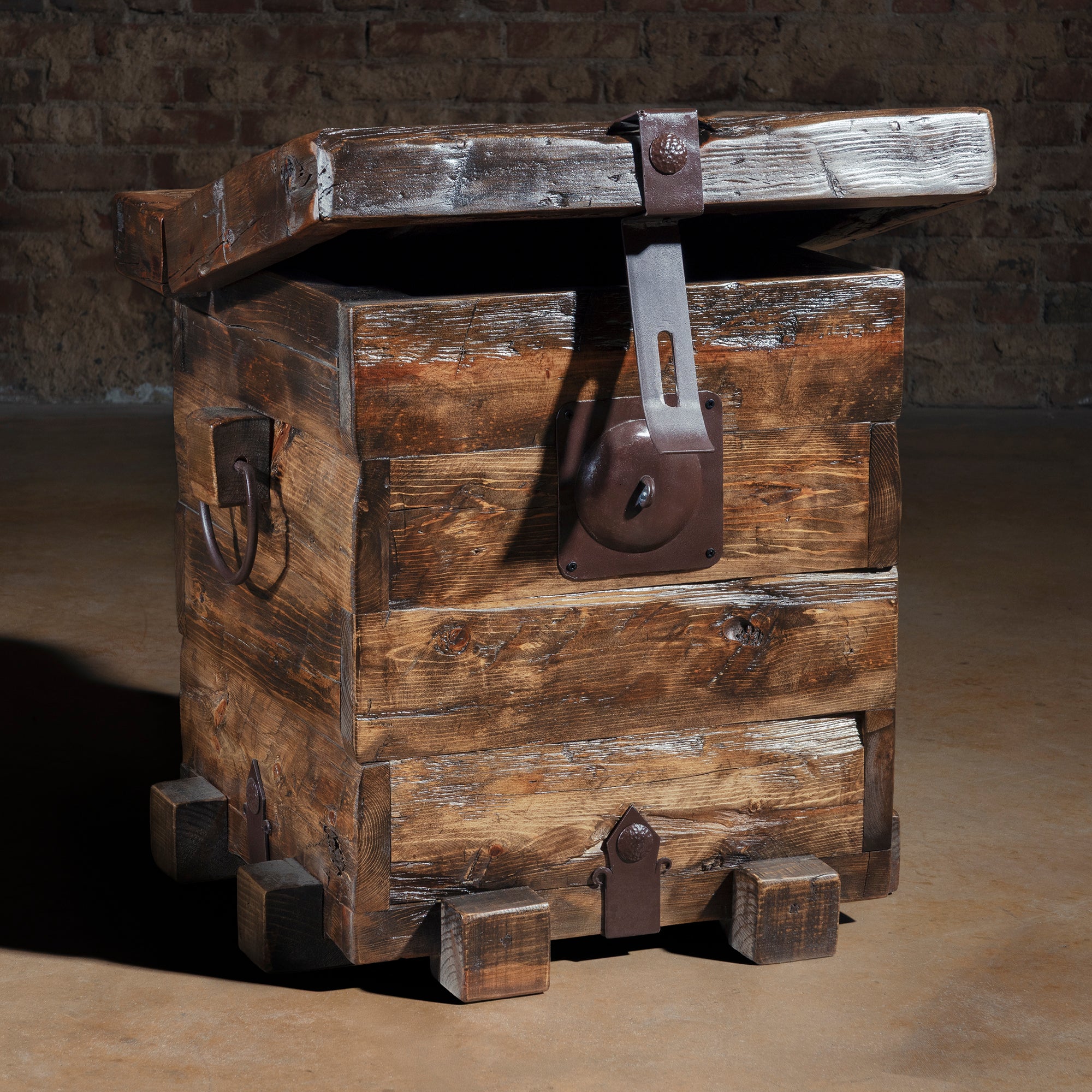 Small reclaimed wood trunk accent table with iron strap hinges and latch hardware