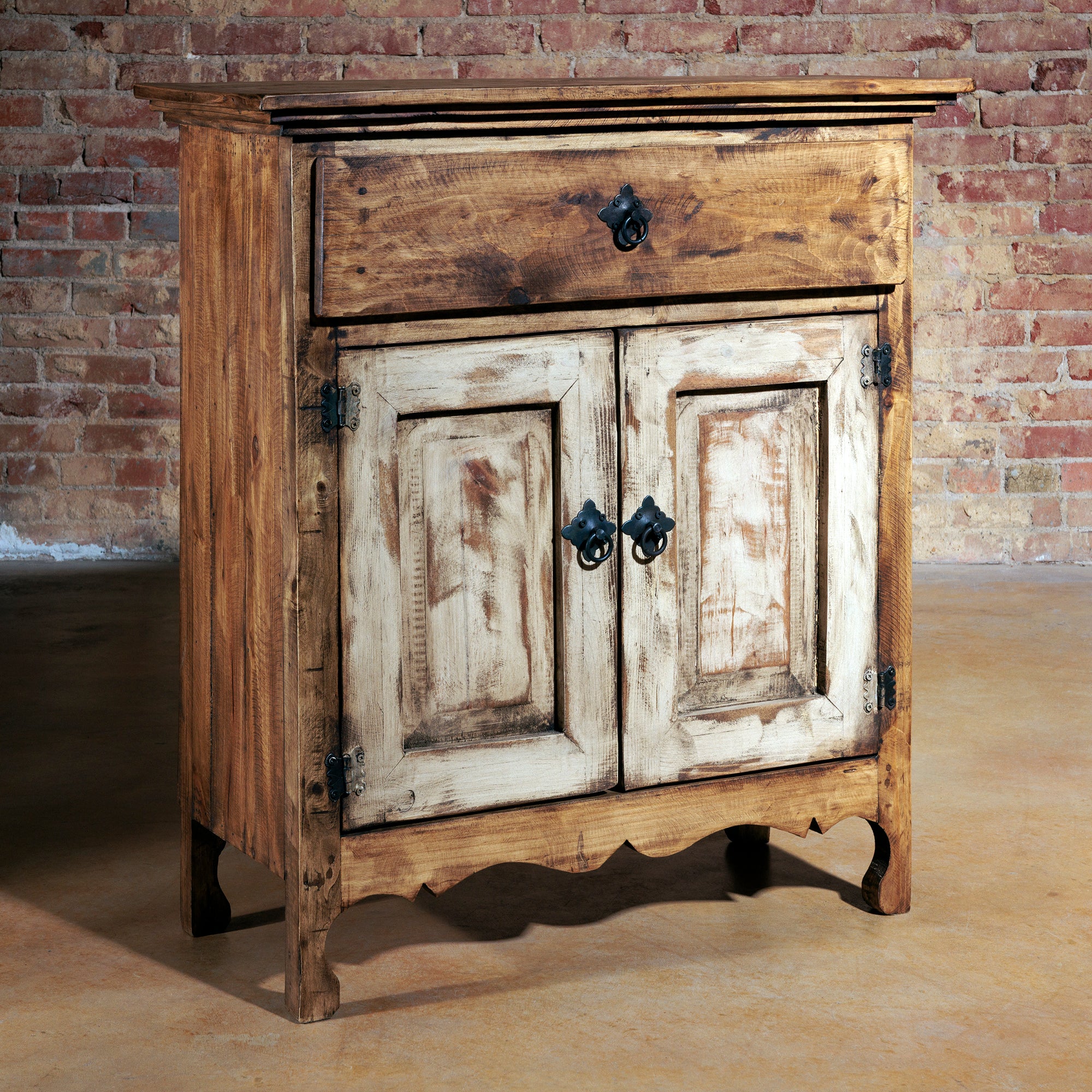 Front view of small rustic wood console with black metal hardware