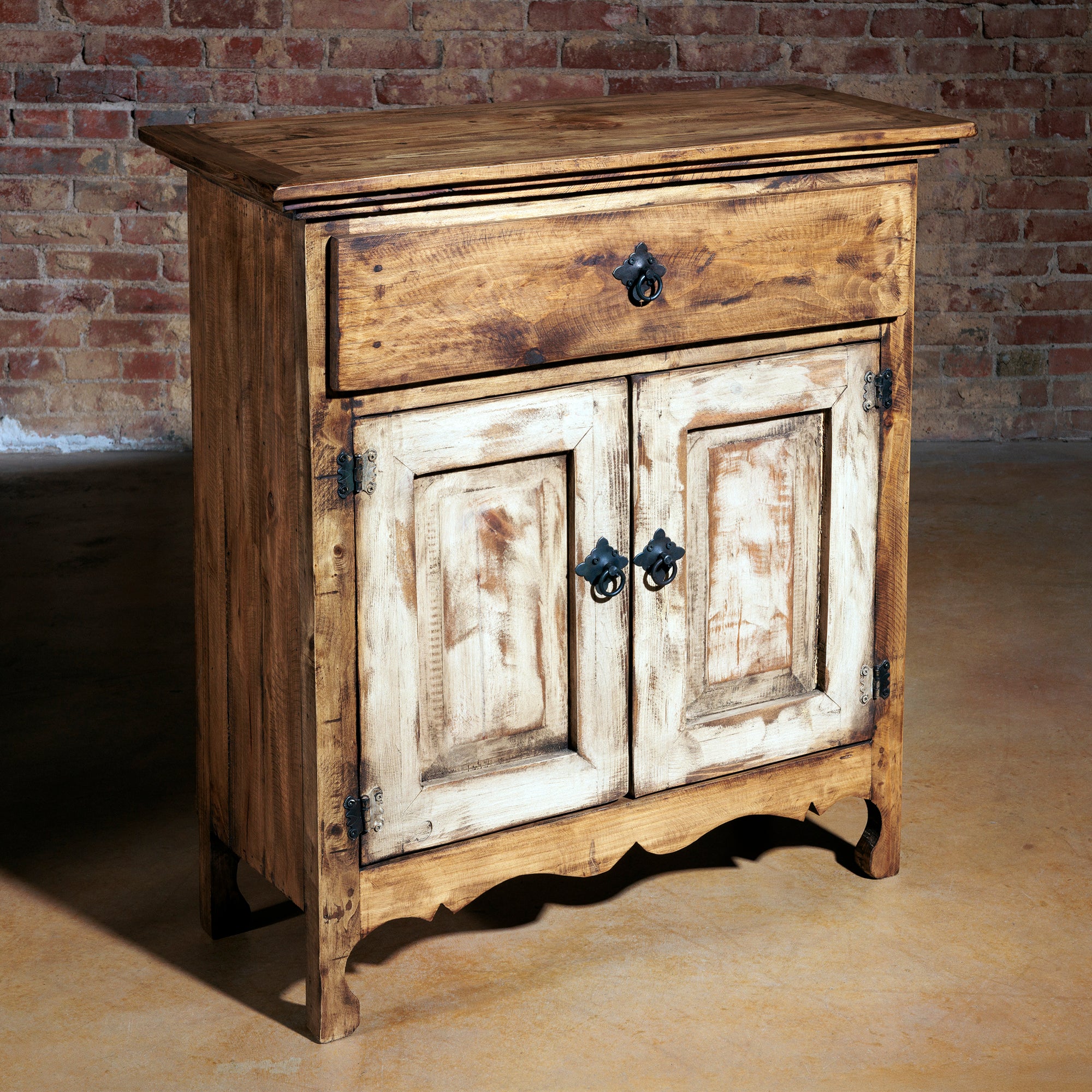 High angle view of rustic wood console with whitewashed door panels