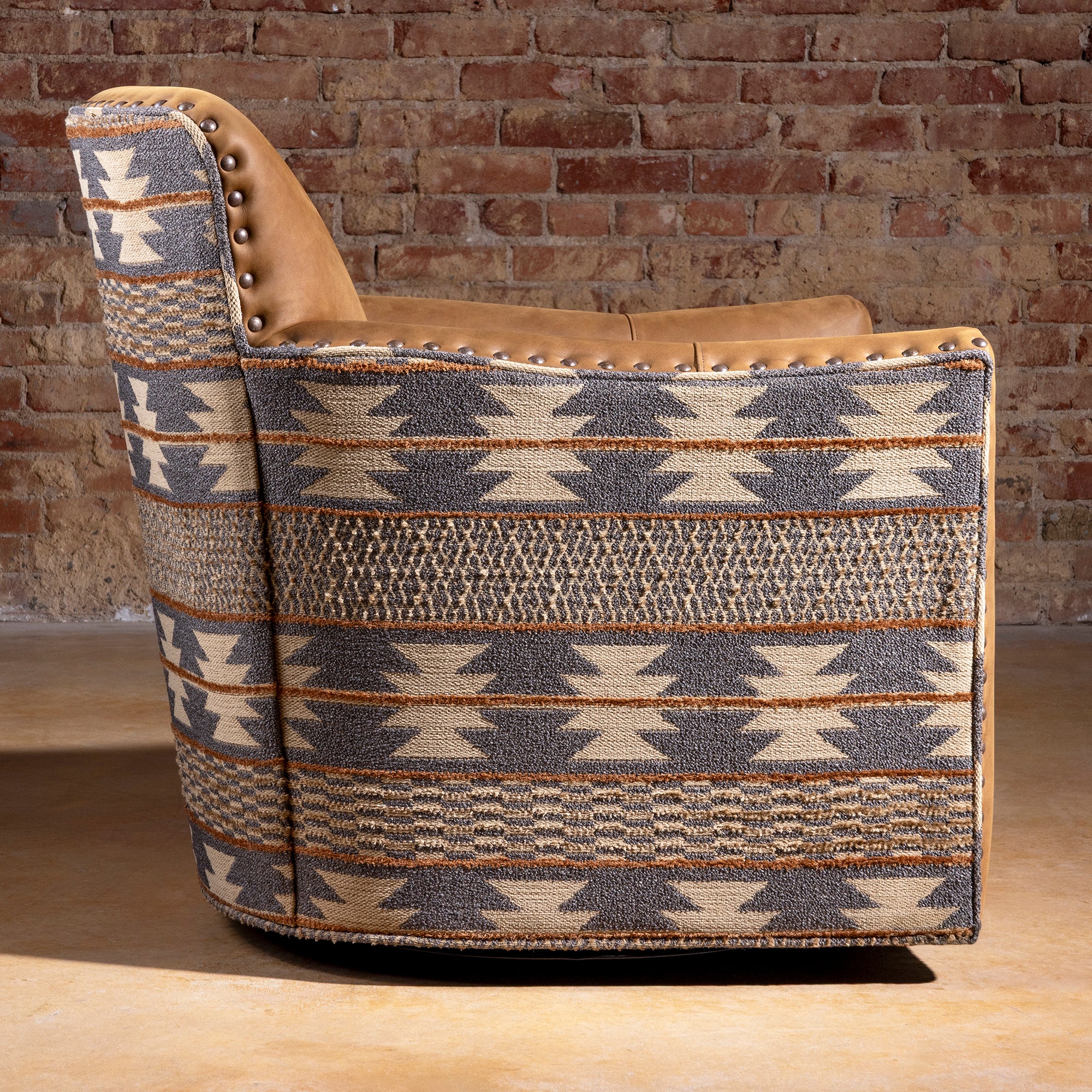 Side profile of Pendleton fabric and leather Western swivel chair