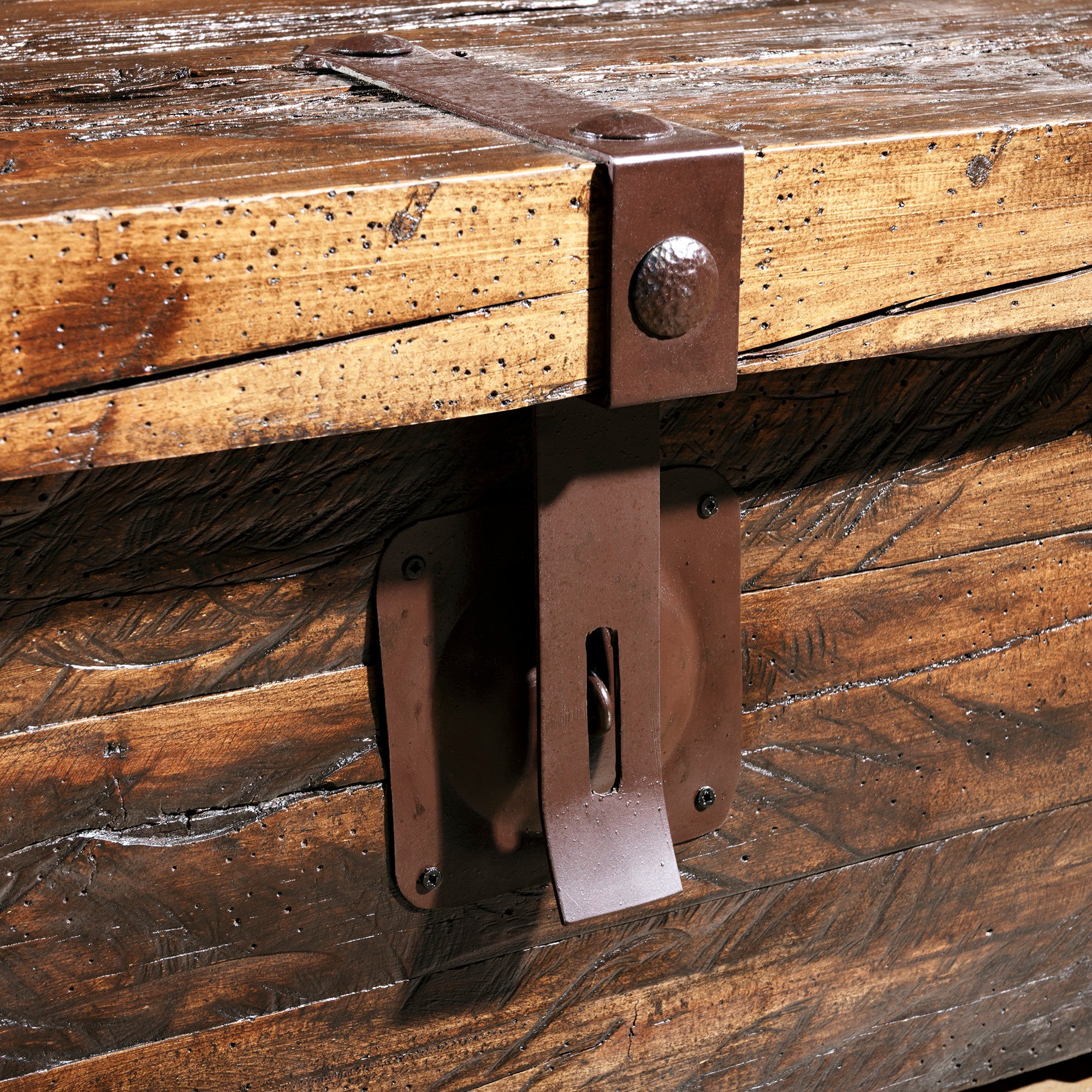Forged-iron latch detail on Outpost Timberlock Trunk Table rustic Western furniture