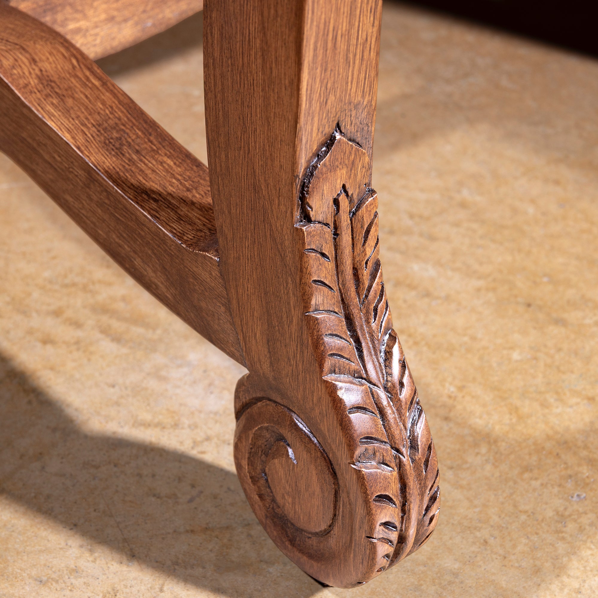 Palacio Verde Dining Chair carved wood leg detail on a luxury western dining chair with green leather upholstery