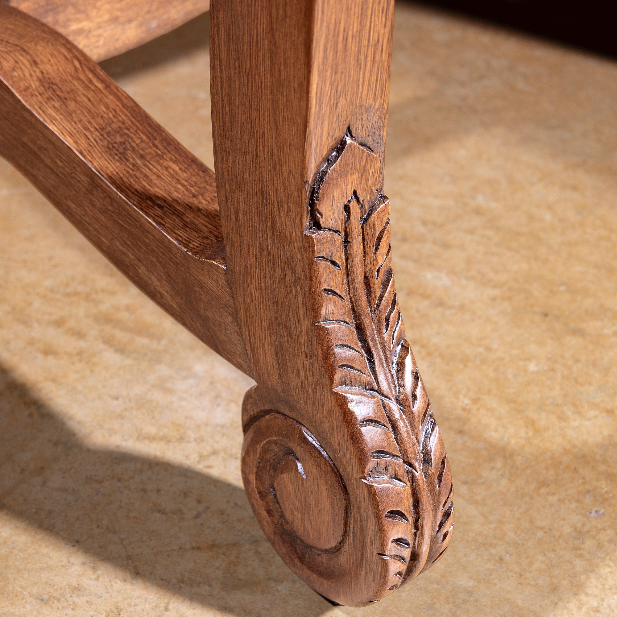 Palacio Verde Dining Chair carved wood leg detail on a luxury western dining chair with green leather upholstery