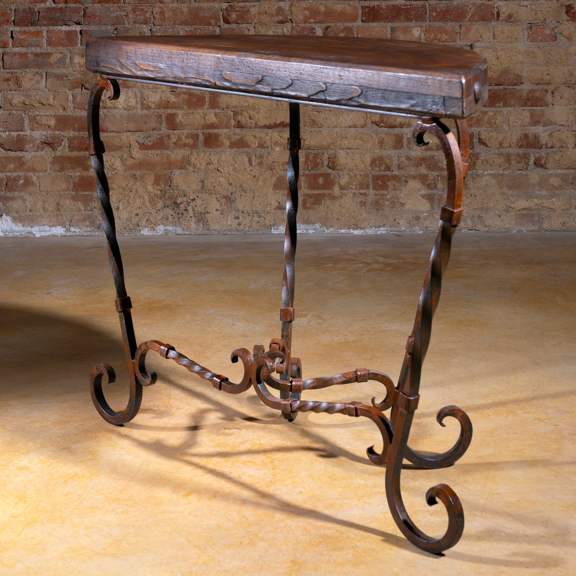 Side angle view of narrow wood and iron Ranchero Scroll Forge Western accent table