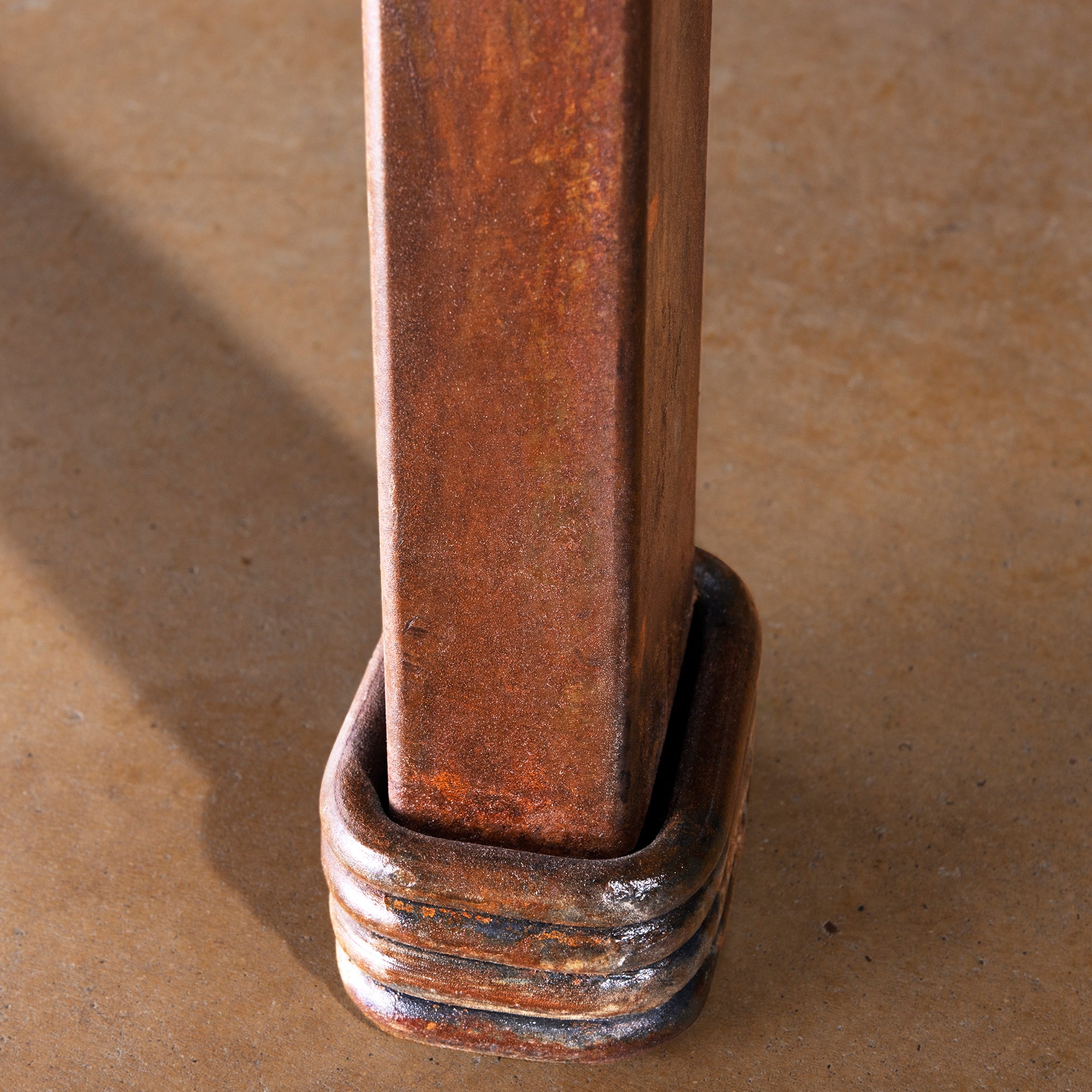 Red Mesa Forge Table base detail showing forged iron foot and hand-finished Western metalwork