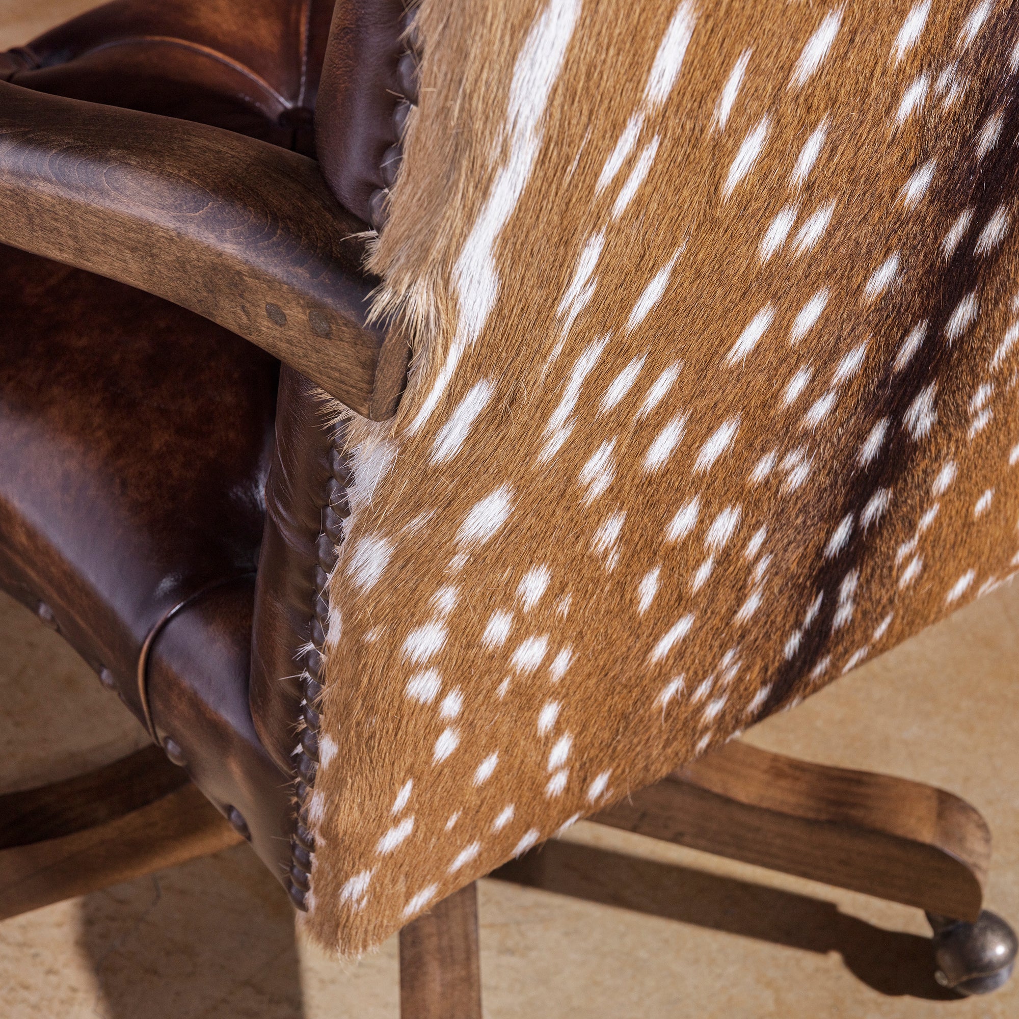 Axis hide close-up on Western leather desk chair back panel