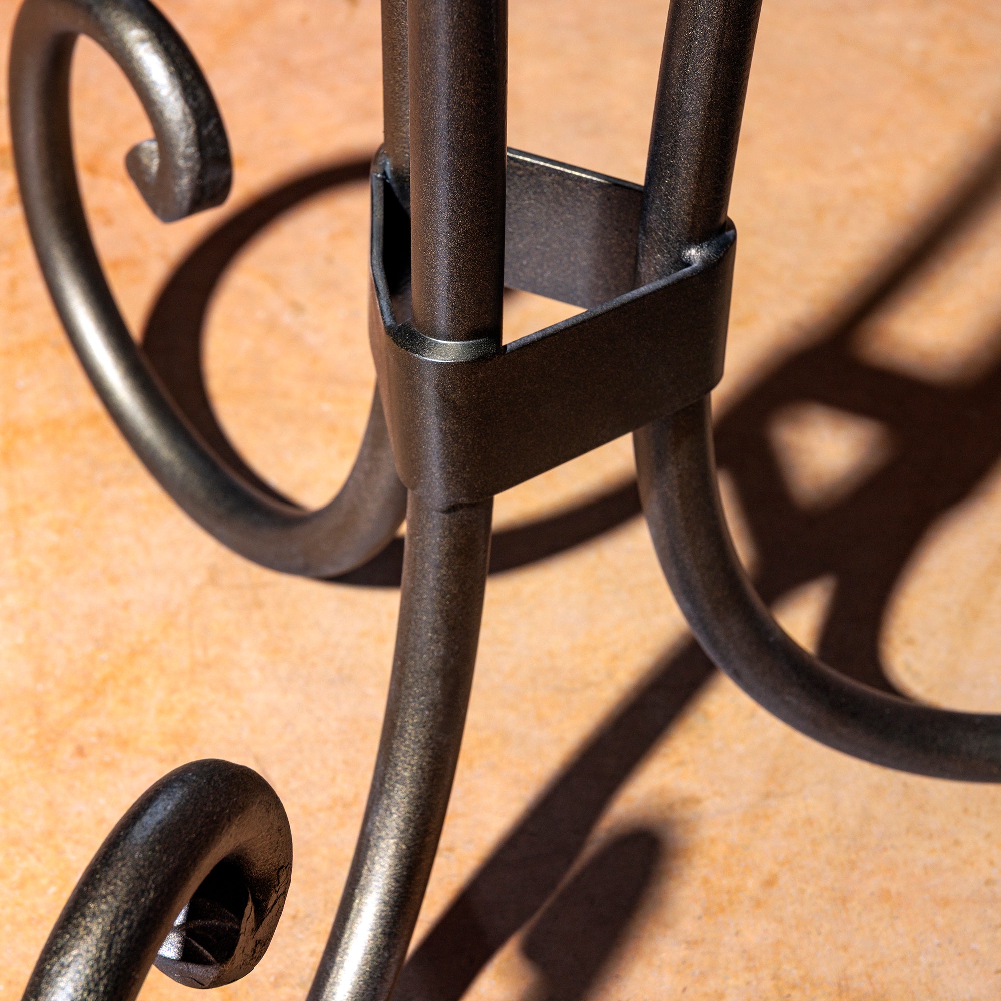 Wrought Iron Base and Joinery Detail of the Durango Flame Accent Table