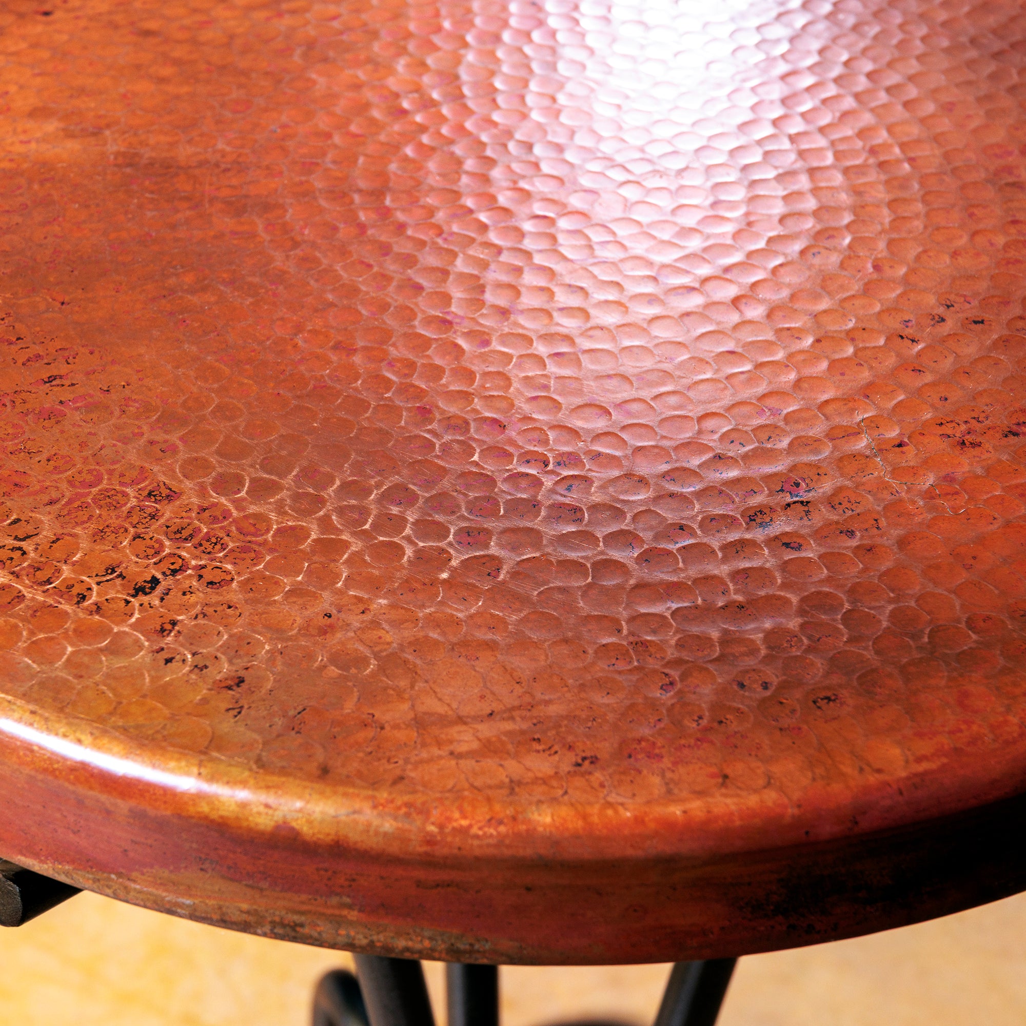 Close-up of the Hand-Hammered Copper Tabletop on the Durango Flame Accent Table