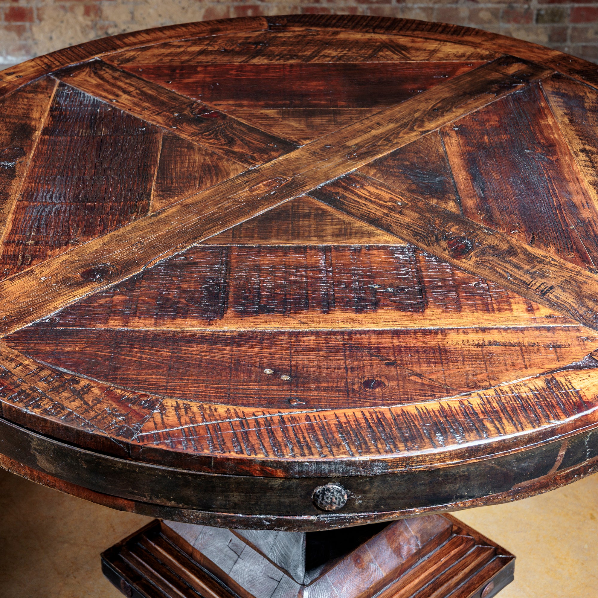 Handcrafted round tabletop with cross plank design and distressed finish