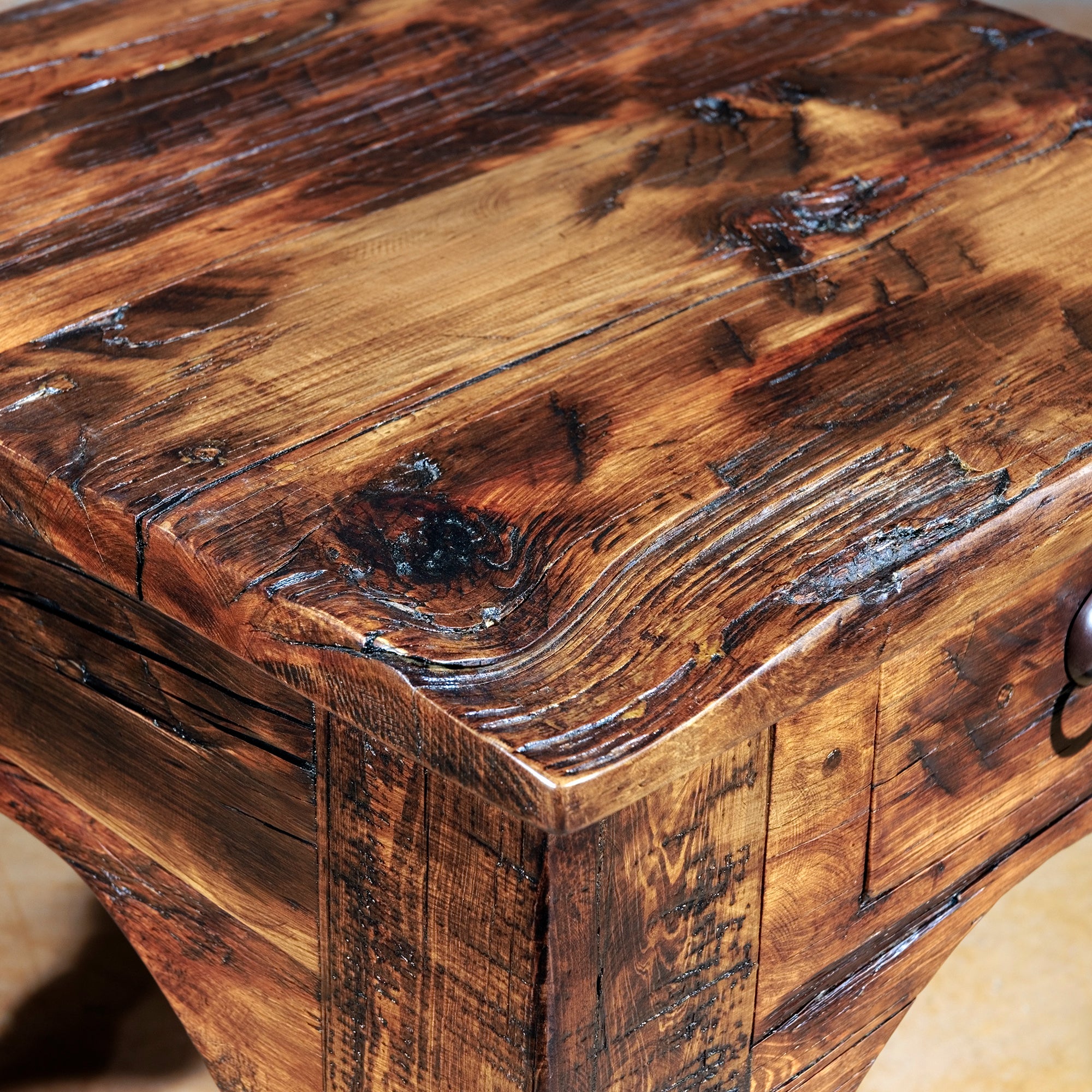 Distressed wood tabletop detail of handcrafted Western accent table