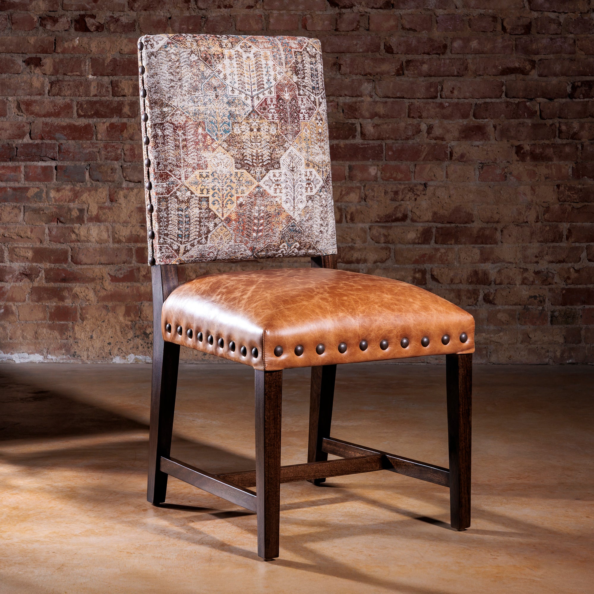 Santa Fe Tapestry Dining Chair with caramel leather seat and vintage textile back