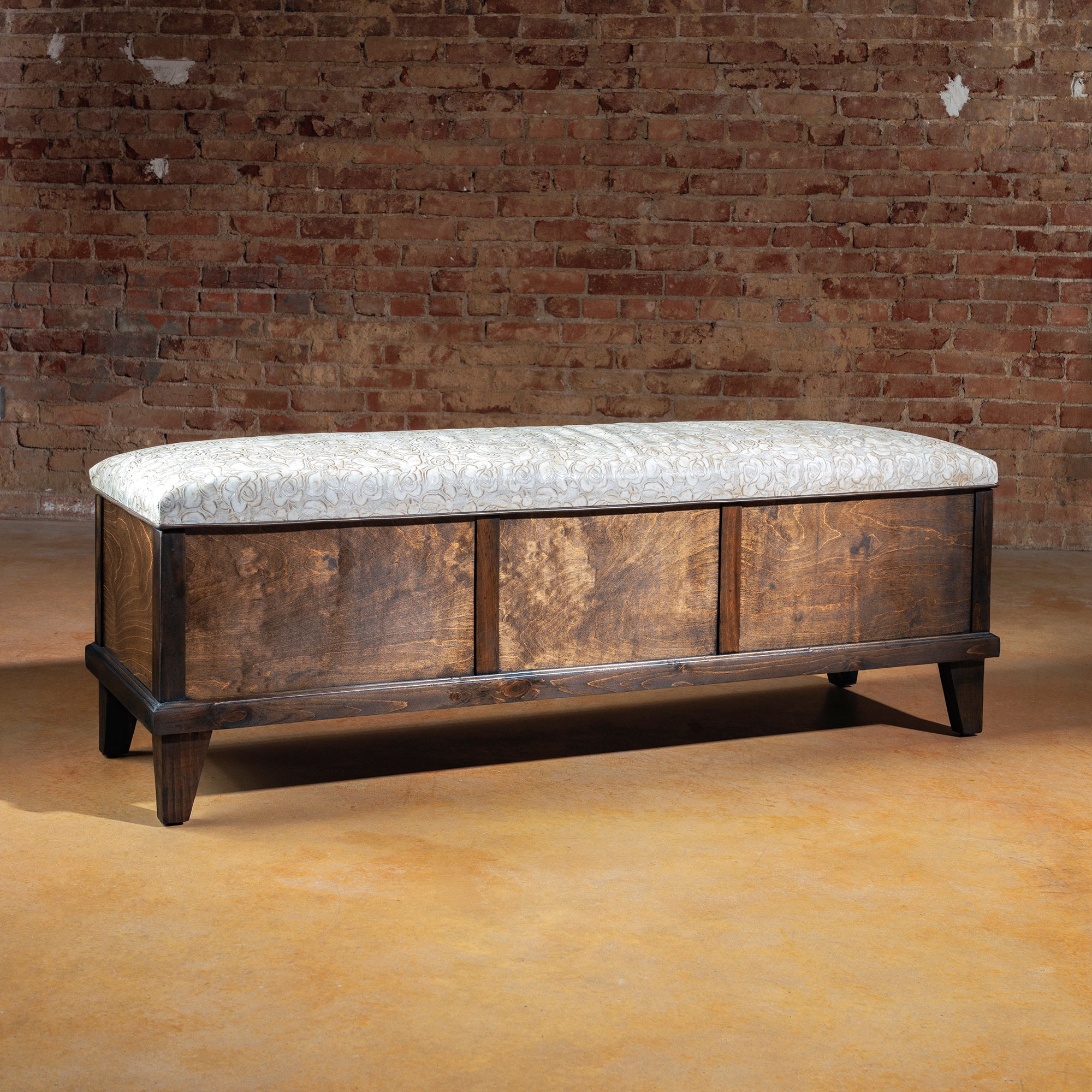 Western bench with storage and tooled leather upholstery