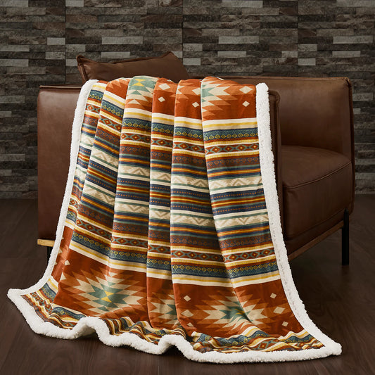 The Sol Campfire Throw is an affordable answer to stylish Southwestern design. Featuring vibrant Aztec prints and a Sherpa reverse, this lightweight throw provides luxurious comfort and warmth. Perfect for cozy nights at home or around a campfire, this throw offers practicality and stylish sophistication.