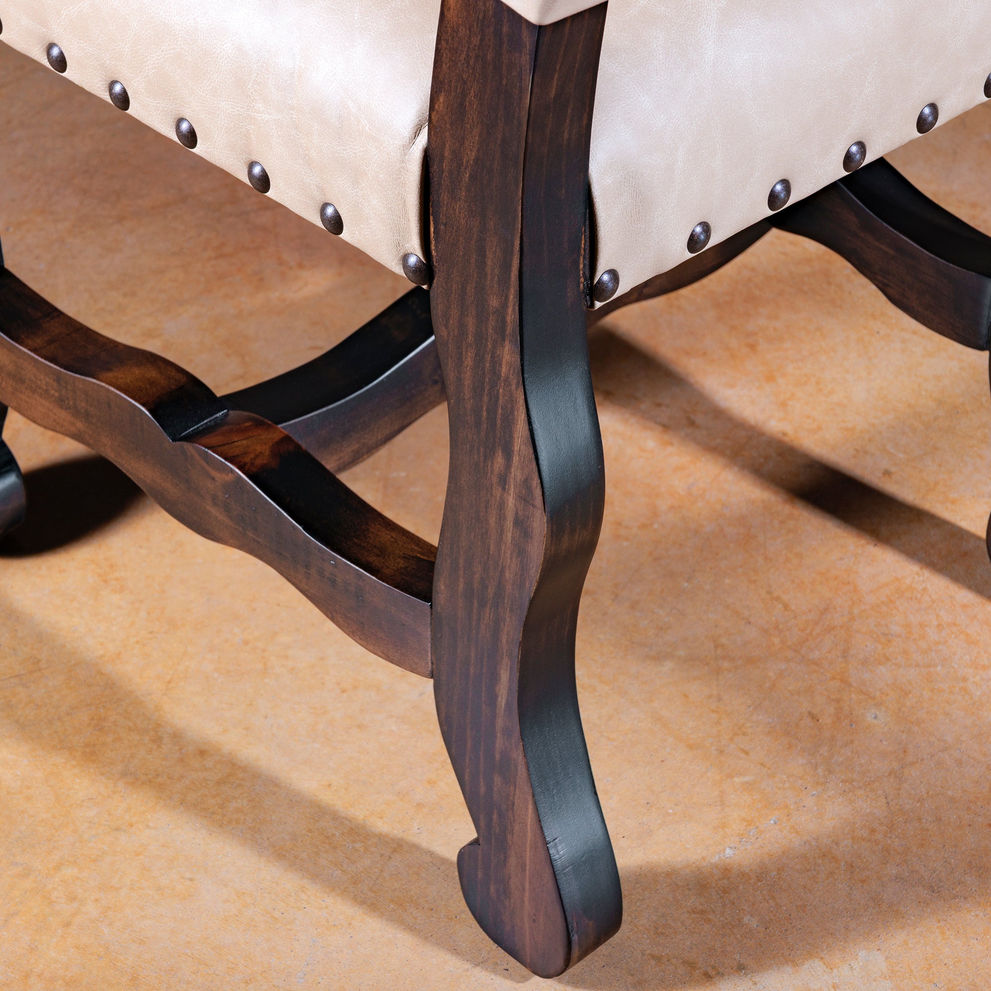 Sculpted alder wood leg detail on Sonora Highback Dining Chair