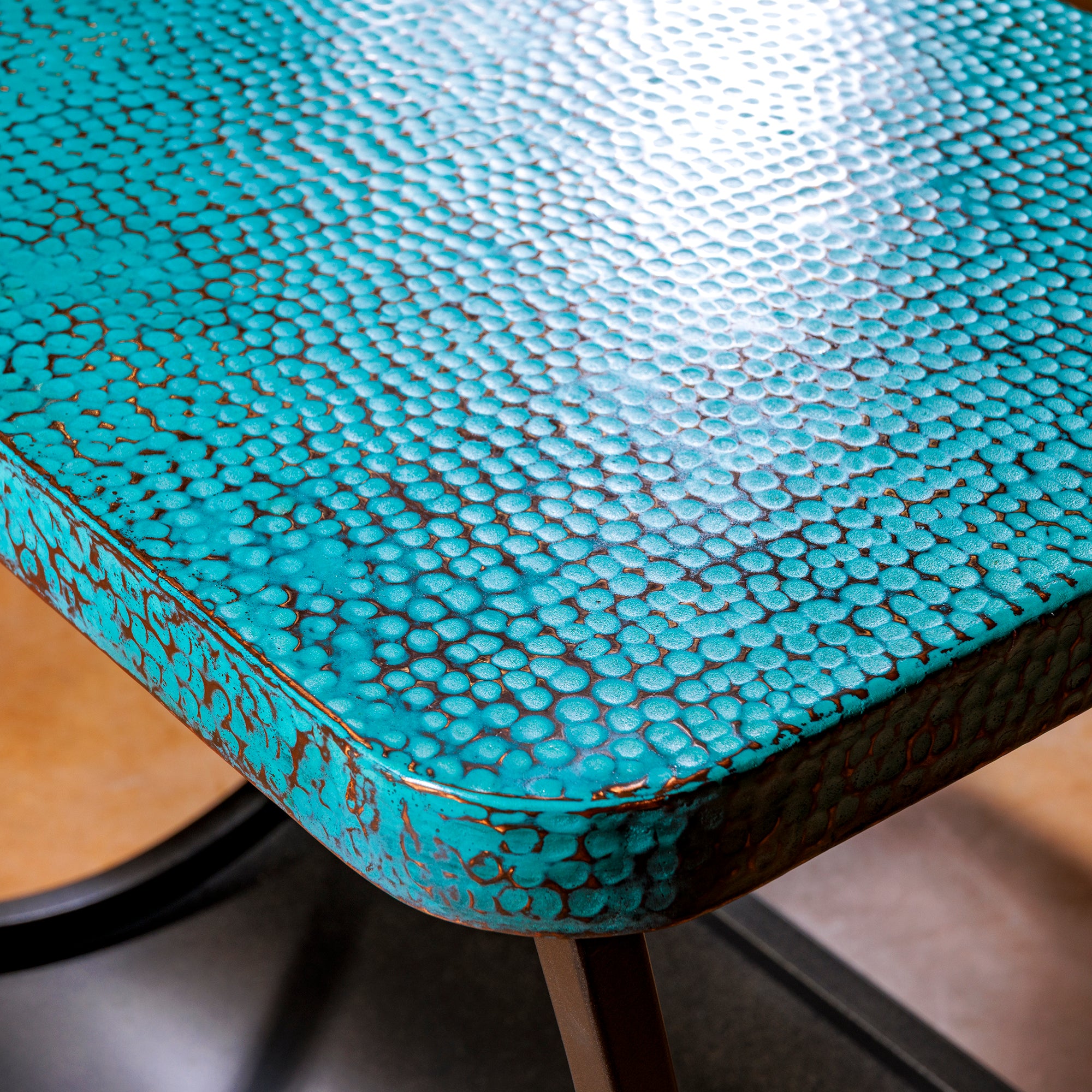 Detail of turquoise copper tabletop texture on Western accent table