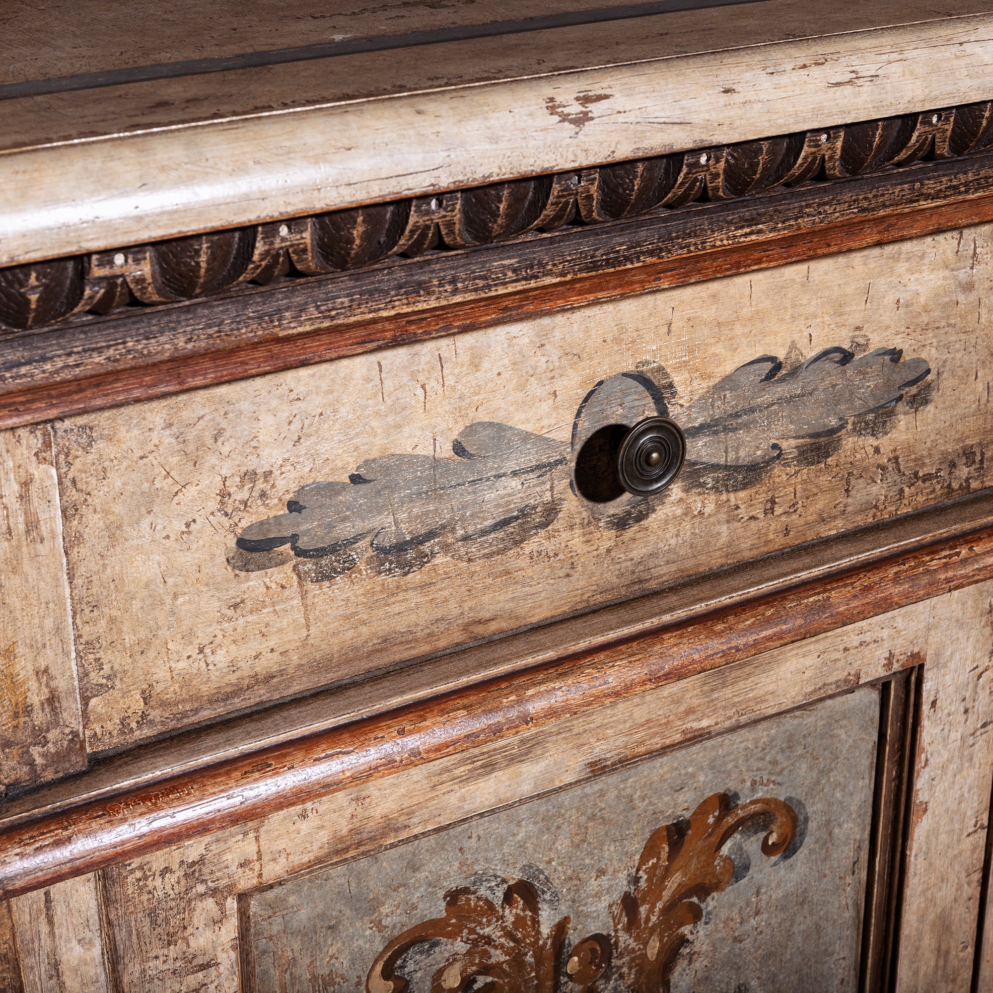 Valencia Crest Heirloom Buffet western buffet sideboard drawer detail with aged painted finish, carved trim, and round metal knob.