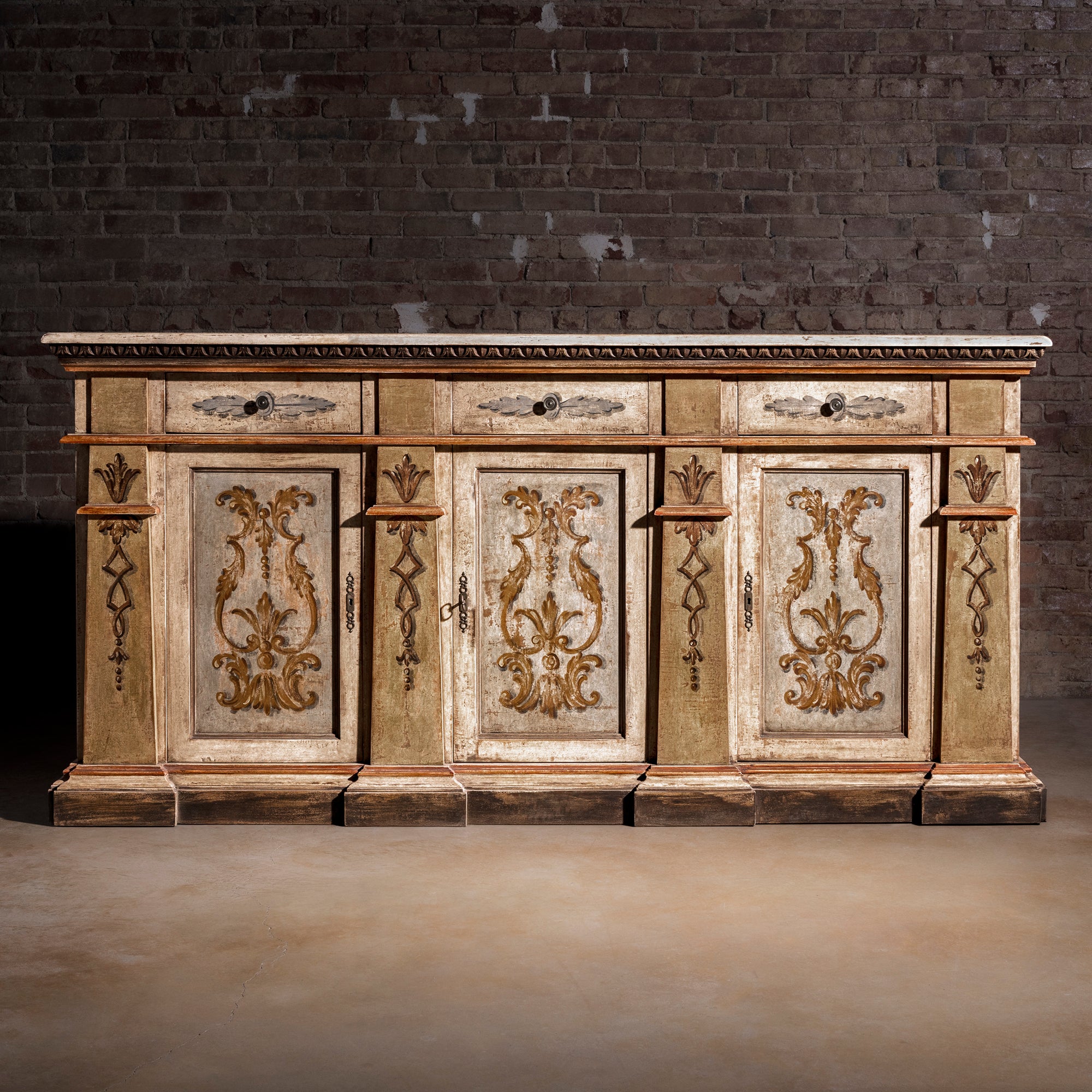 Valencia Crest Heirloom Buffet western buffet sideboard shown closed with three drawers, three doors, and painted old-world panels.