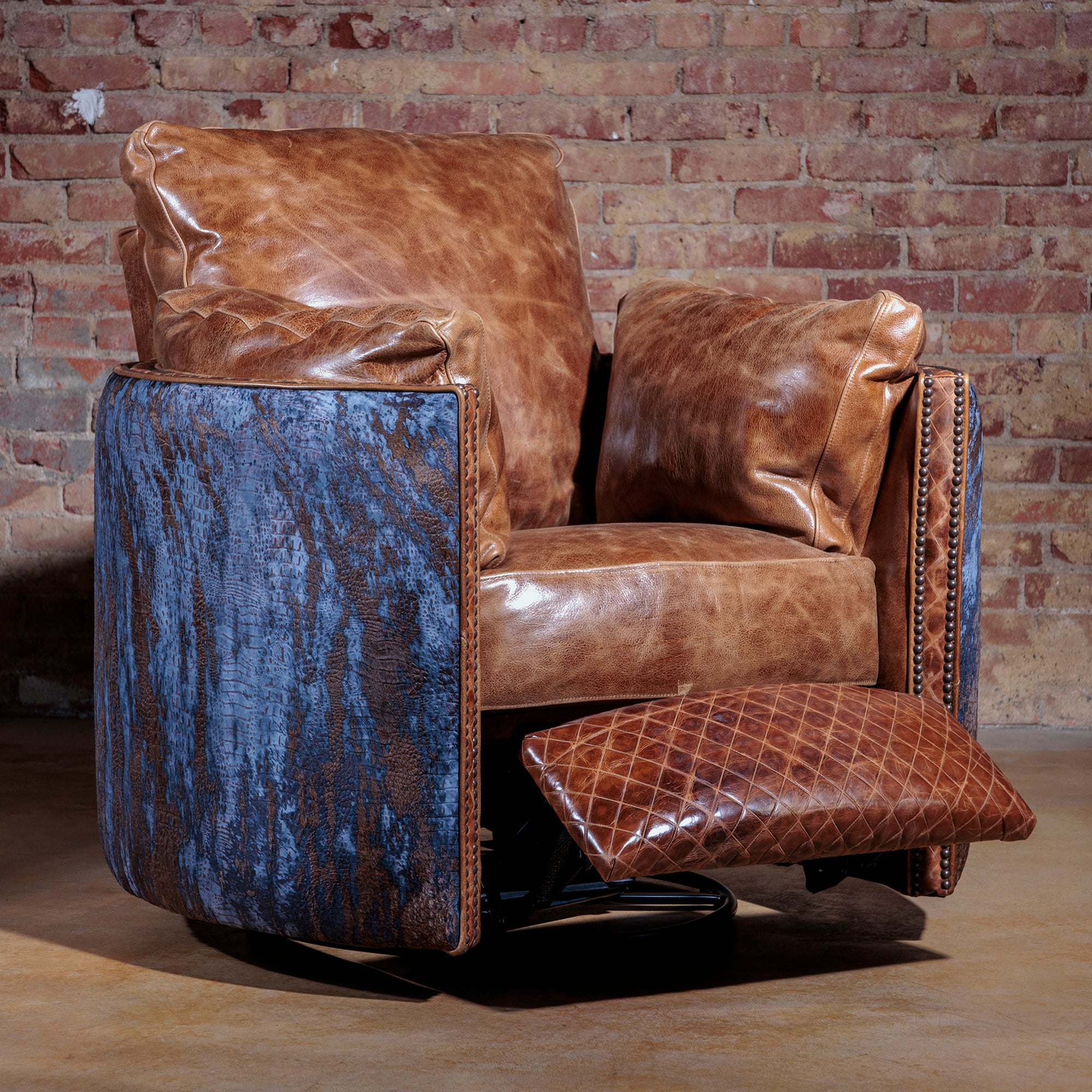 Oversized leather Western recliner with 360-degree swivel and brindle cowhide accents