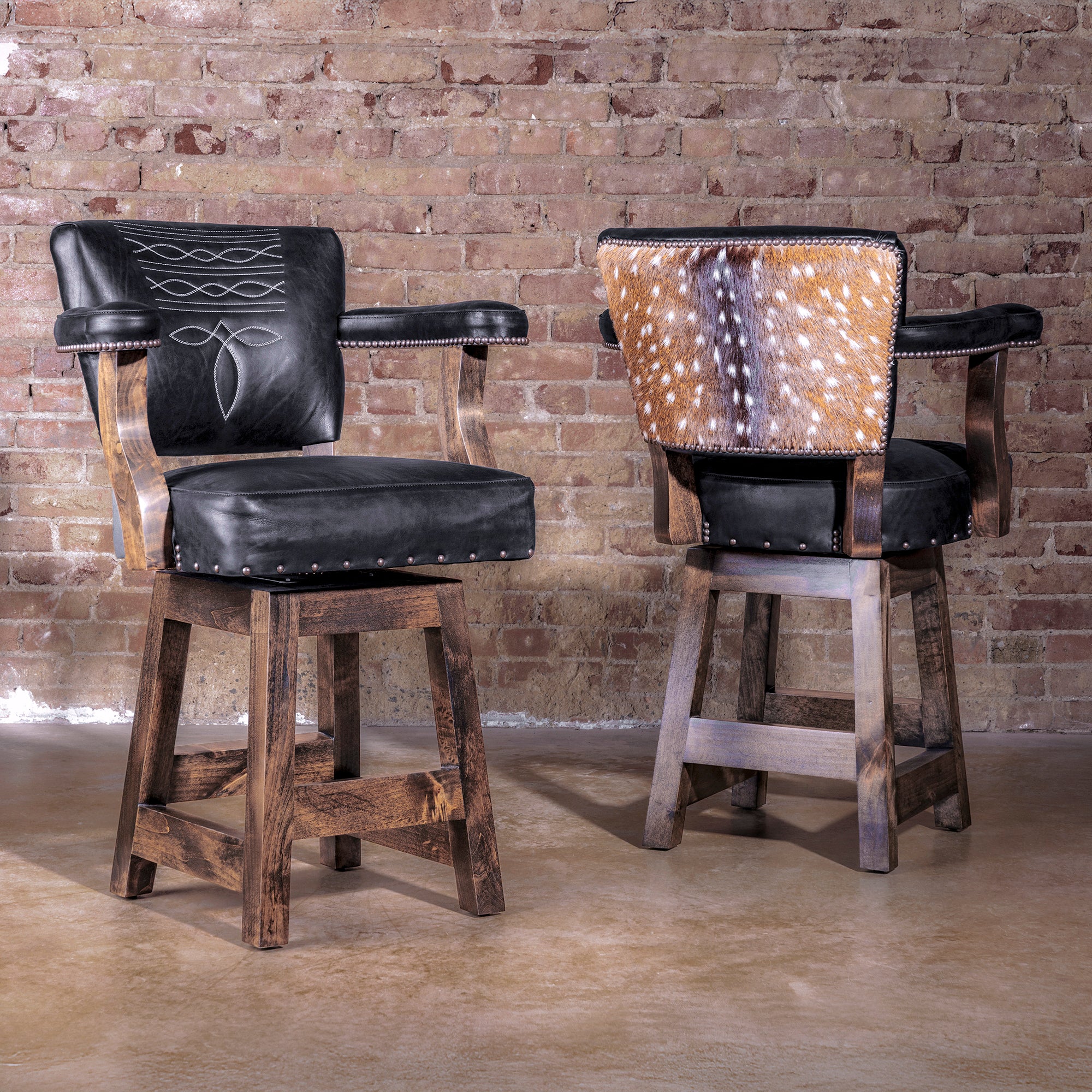 Front view of The Bandera Axis Swivel Stool in black leather with boot stitch