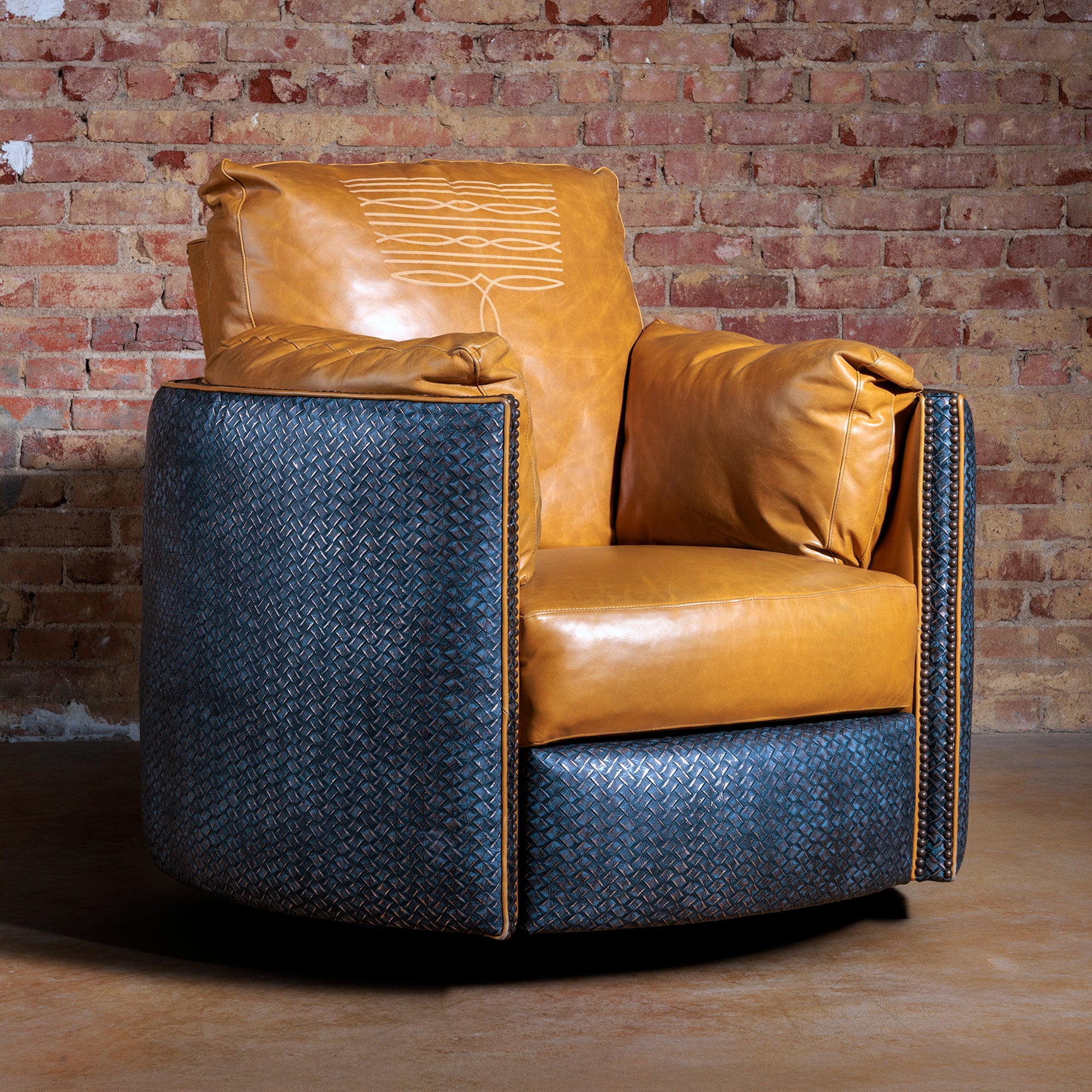 Front view of Denim Boot Stitch Western leather recliner with oversized cuddler design