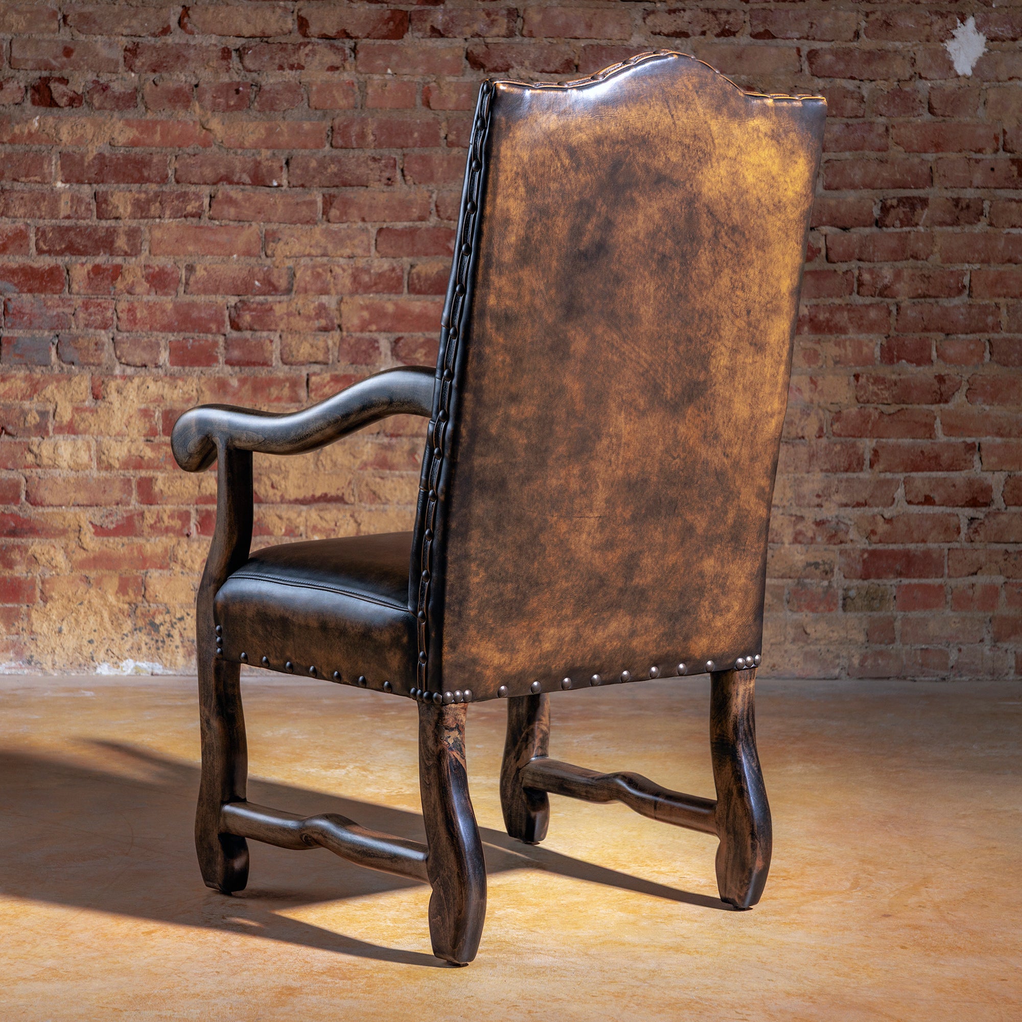 western brown button tufted leather arm chair