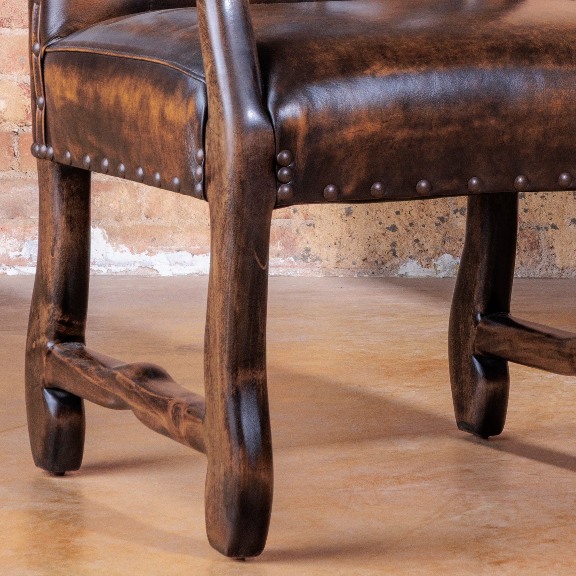 western-button-tufted-leather-arm-chair
