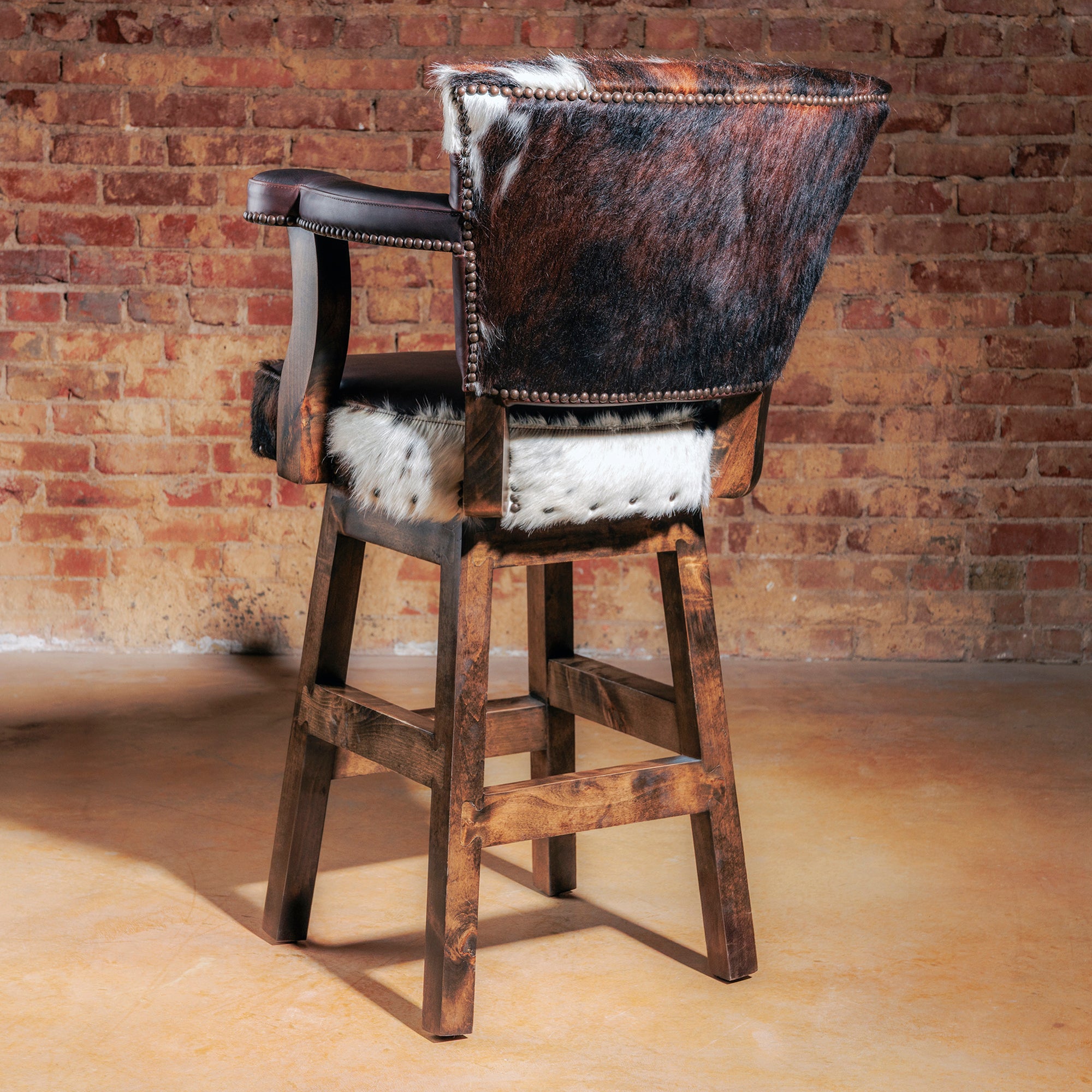 Brazilian cowhide backrest on Western bar stool with solid wood frame