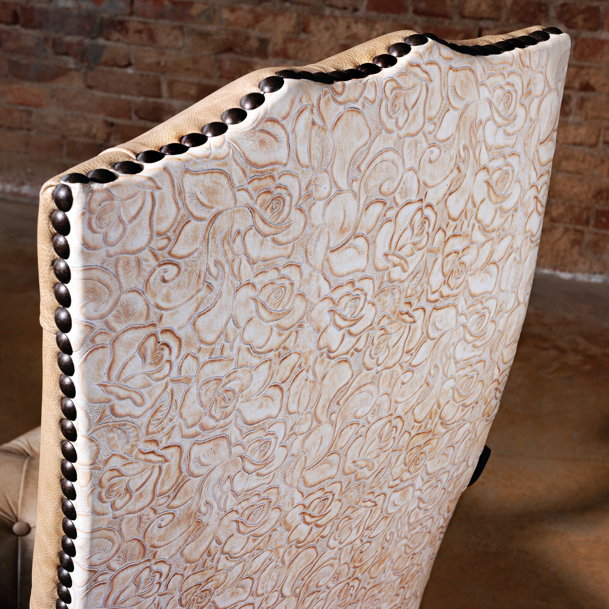 high-end western leather desk chair with embossed floral leather on back