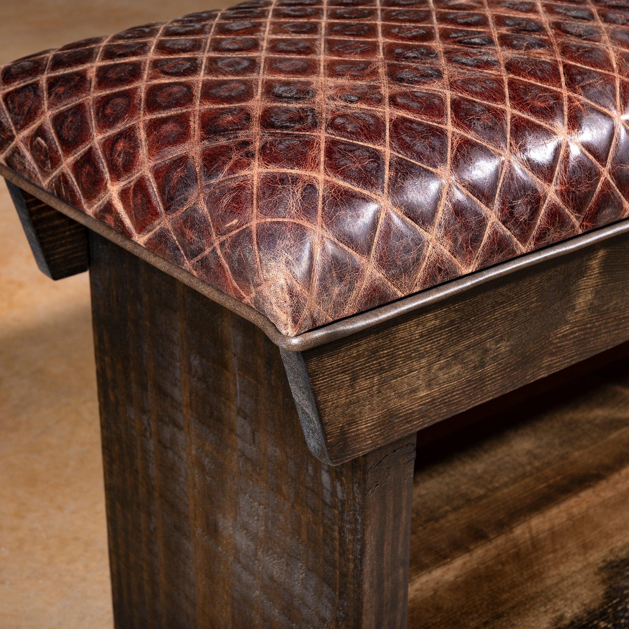 Corner detail of Mesa Royale Bench showing rustic hardwood base