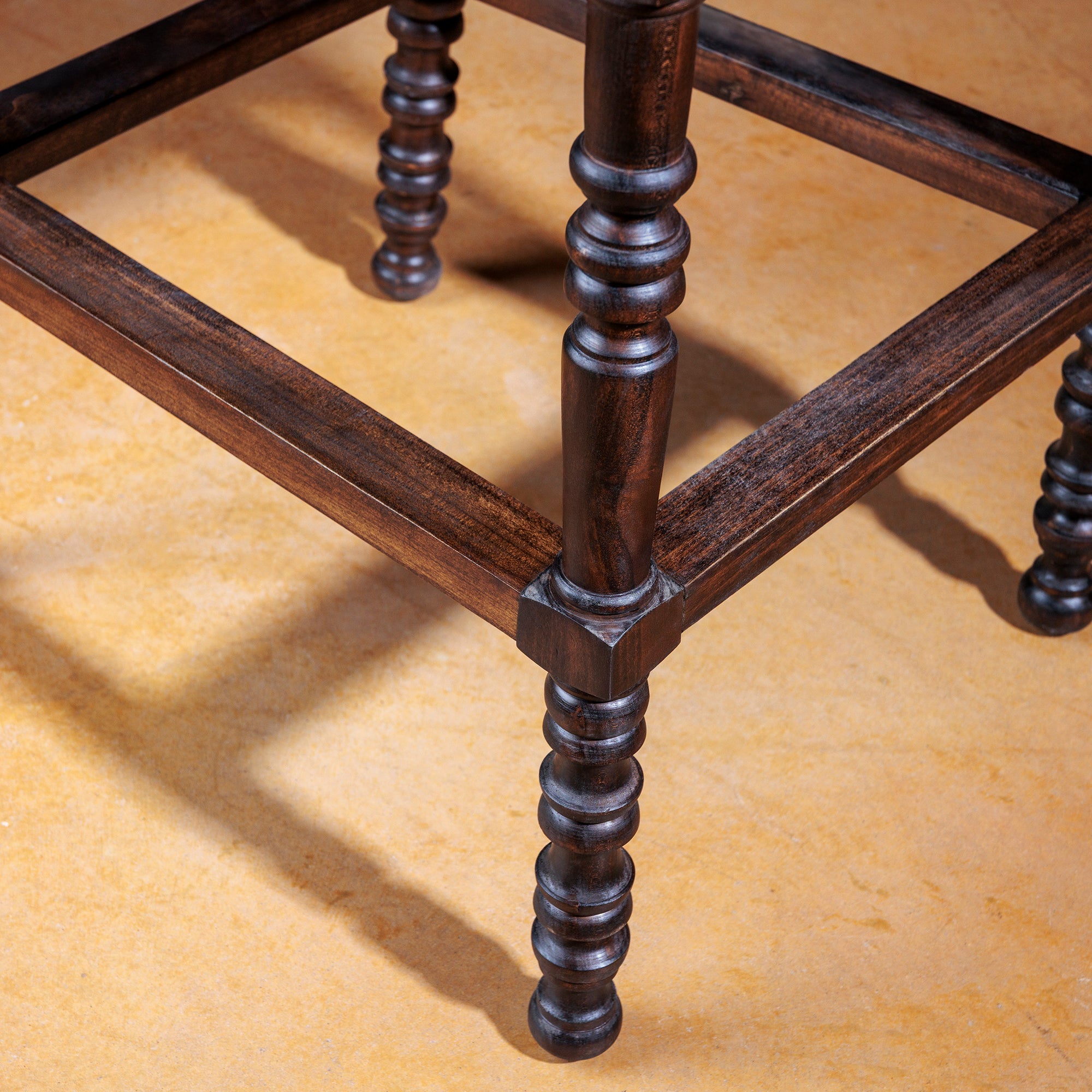 Handcrafted Western leather bar stool with nailhead trim and solid wood legs