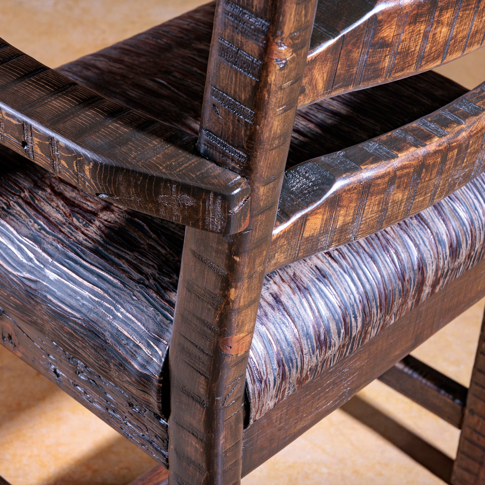 Angle detail of Legacy Ladderback Arm Chair in solid rustic wood