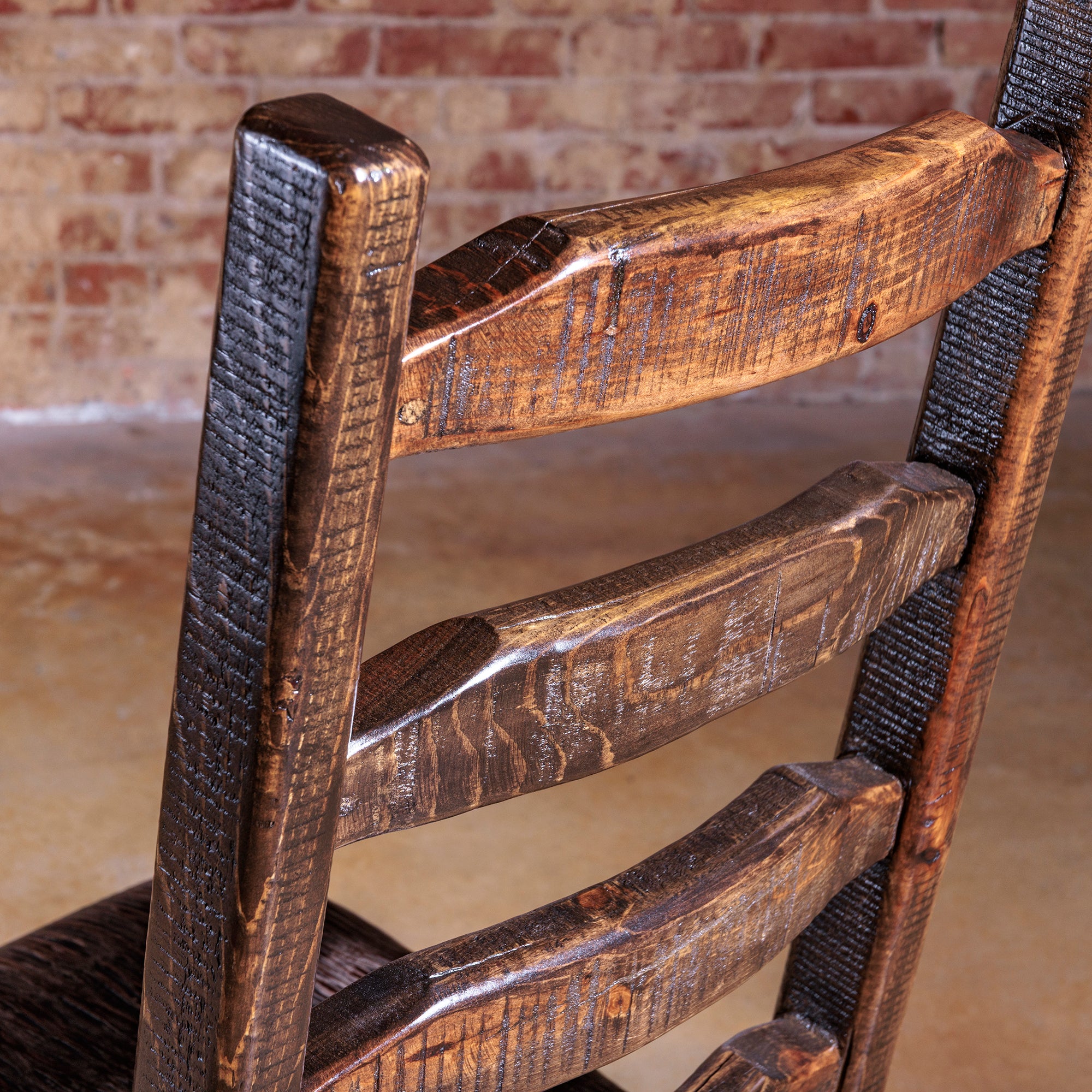 Rustic reclaimed wood grain detail on Legacy Ladderback Side Chair