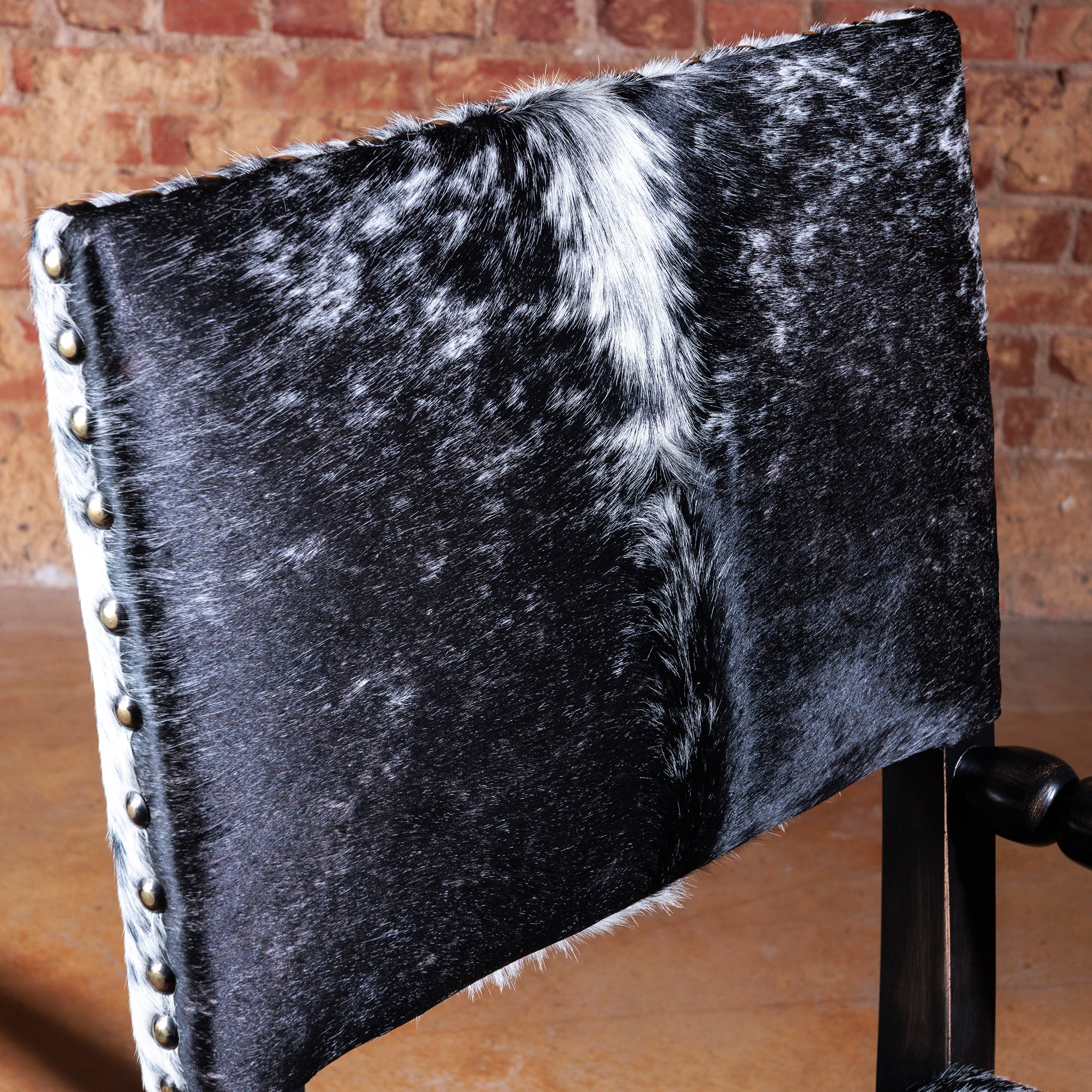 western black and white cowhide accent chair