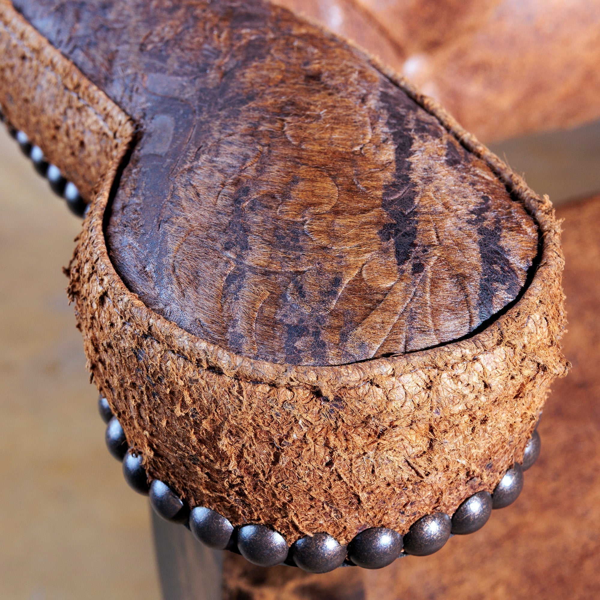Into the West's Leather Legacy: Exploring the Art of Leatherwork in Western Furniture