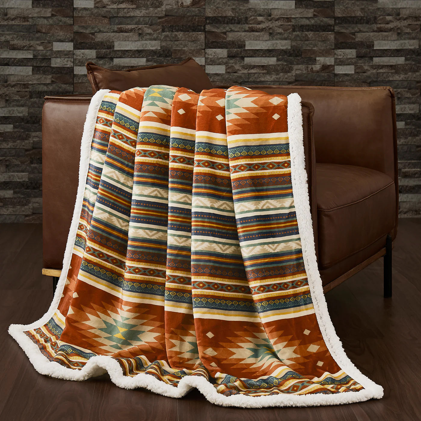 Handcrafted Western ranch-style pillows and throws in a rustic luxury living room setting