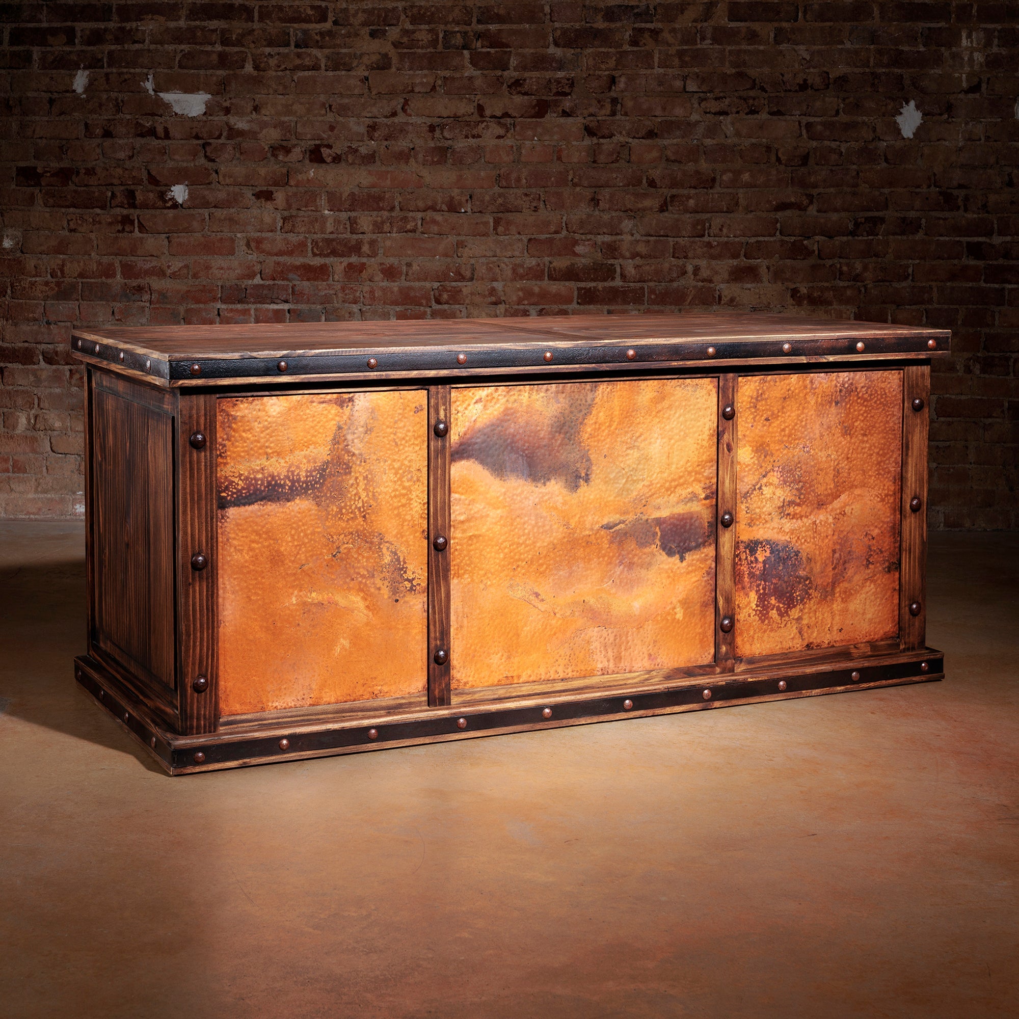 Handcrafted rustic Western desk with reclaimed wood and iron detailing, ideal for luxury ranch offices